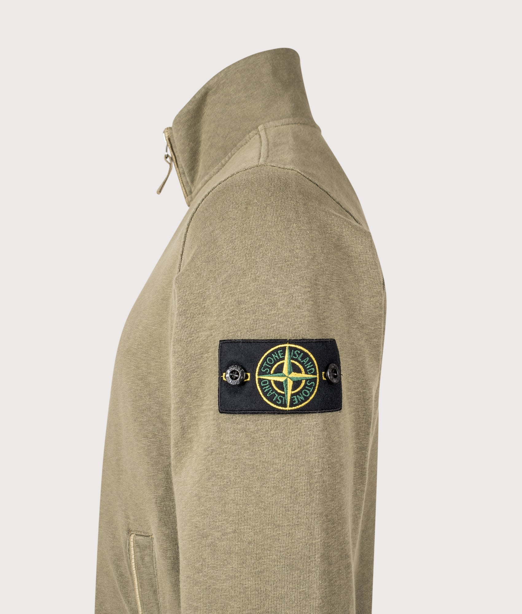Stone Island Malfilé ‘Old’ Treatment Zip Up Track Jacket in Military green at EQVVS Menswear. Detail shot.
