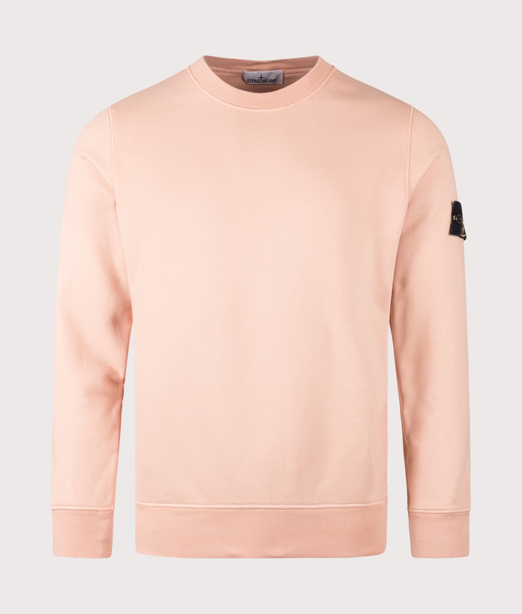 Stone Island Organic Cotton Sweatshirt in Chalk Pink at EQVVS Menswear. Front shot.