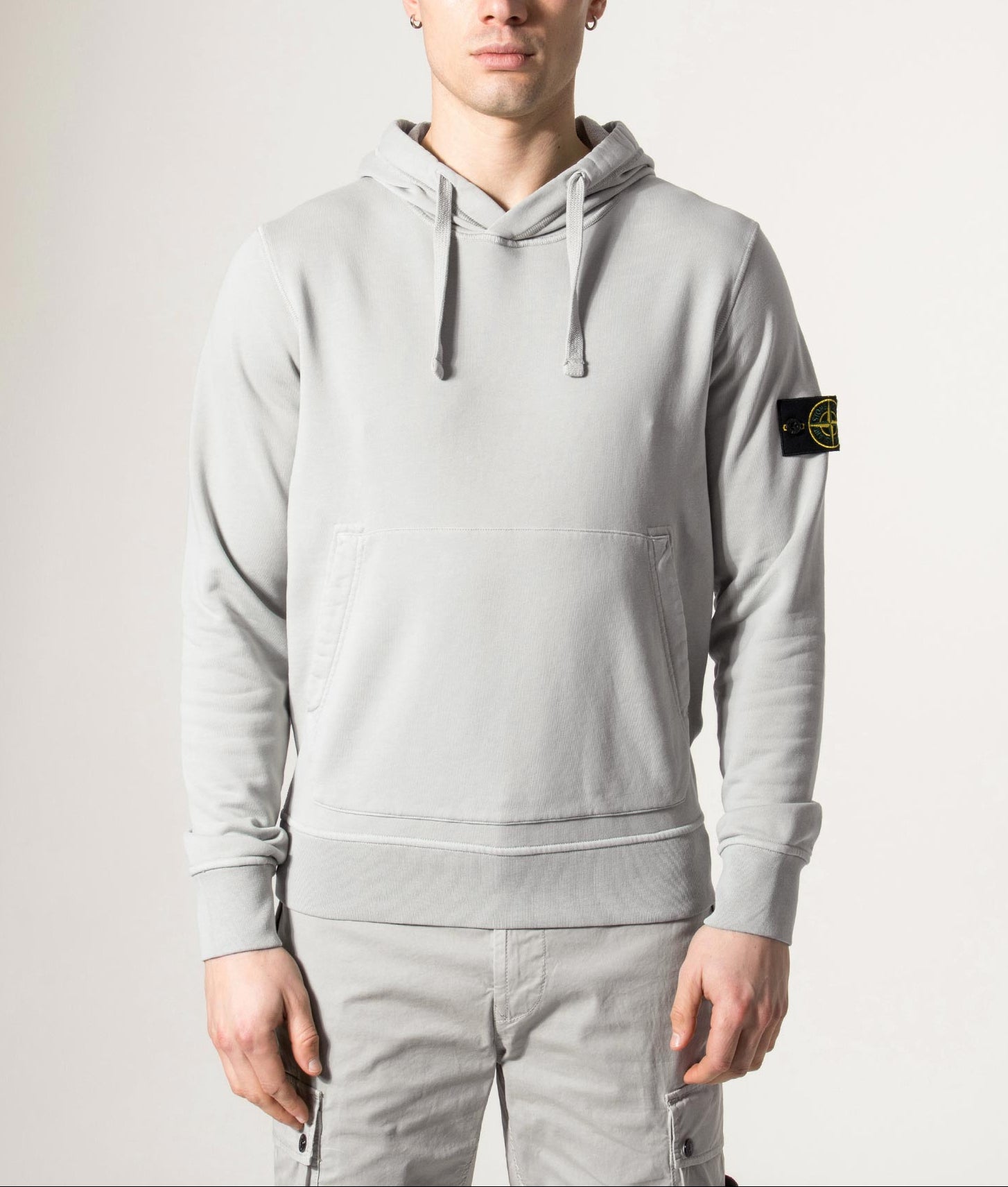Stone Island Organic Cotton Hoodie in Sage at EQVVS Menswear. Model front shot.