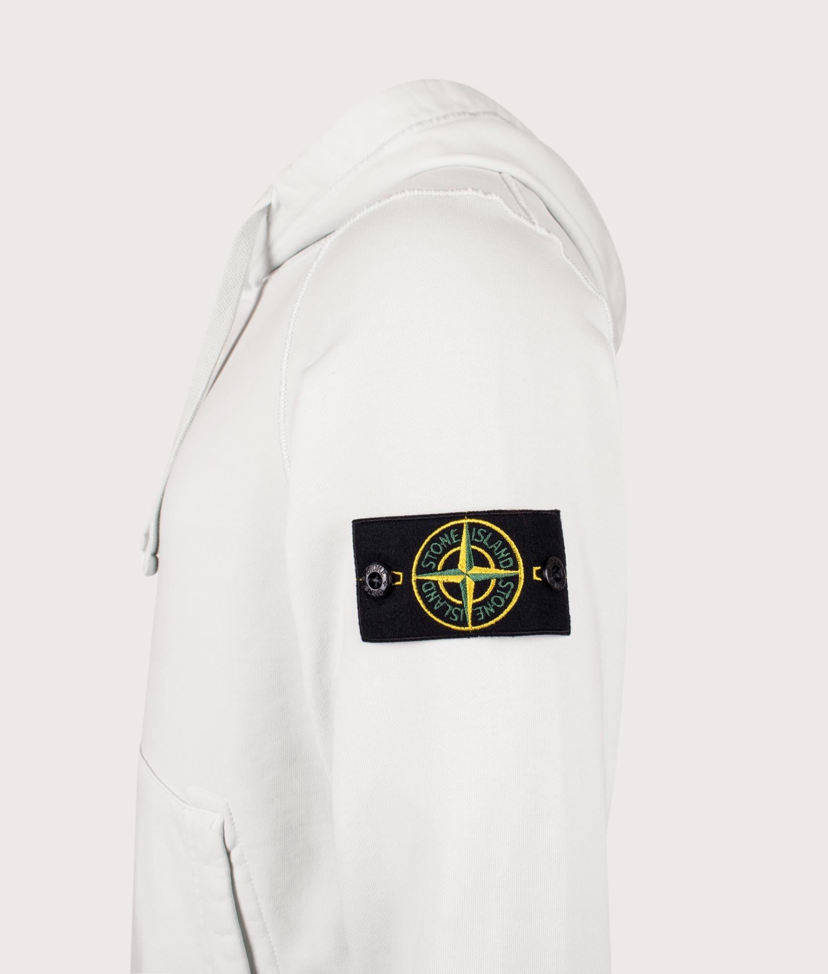 Stone Island Organic Cotton Hoodie in Sky Blue at EQVVS Menswear. Detail shot.