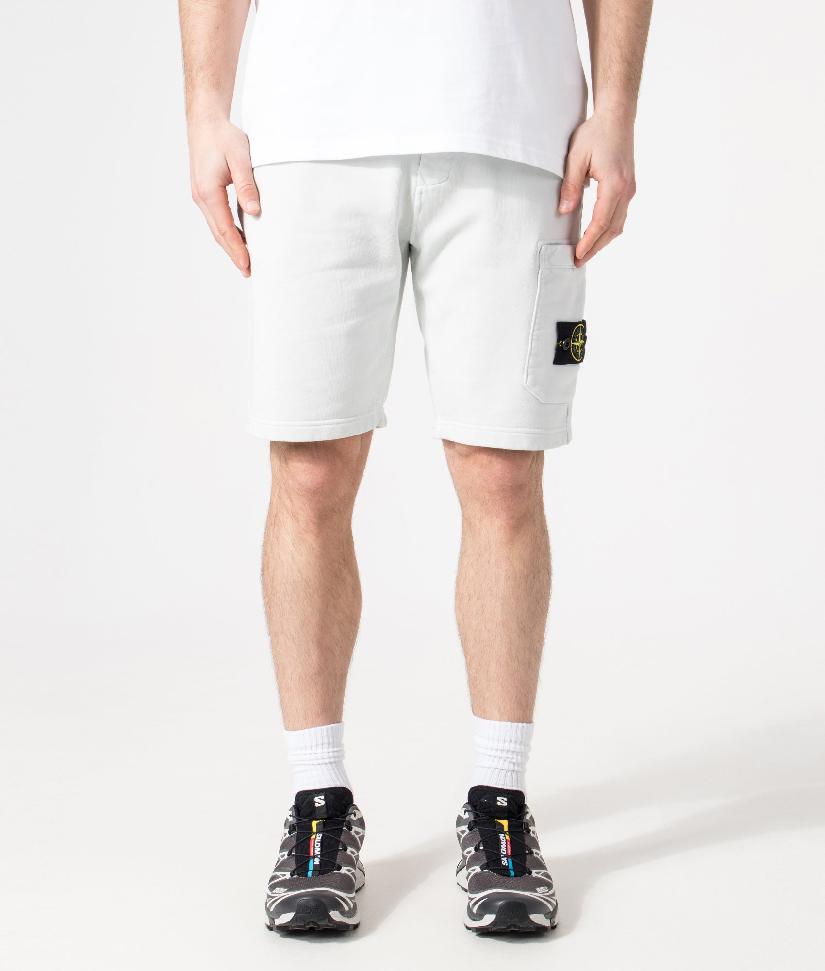 Stone Island Sweat Shorts in Sky Blue at EQVVS Menswear. Model front shot.