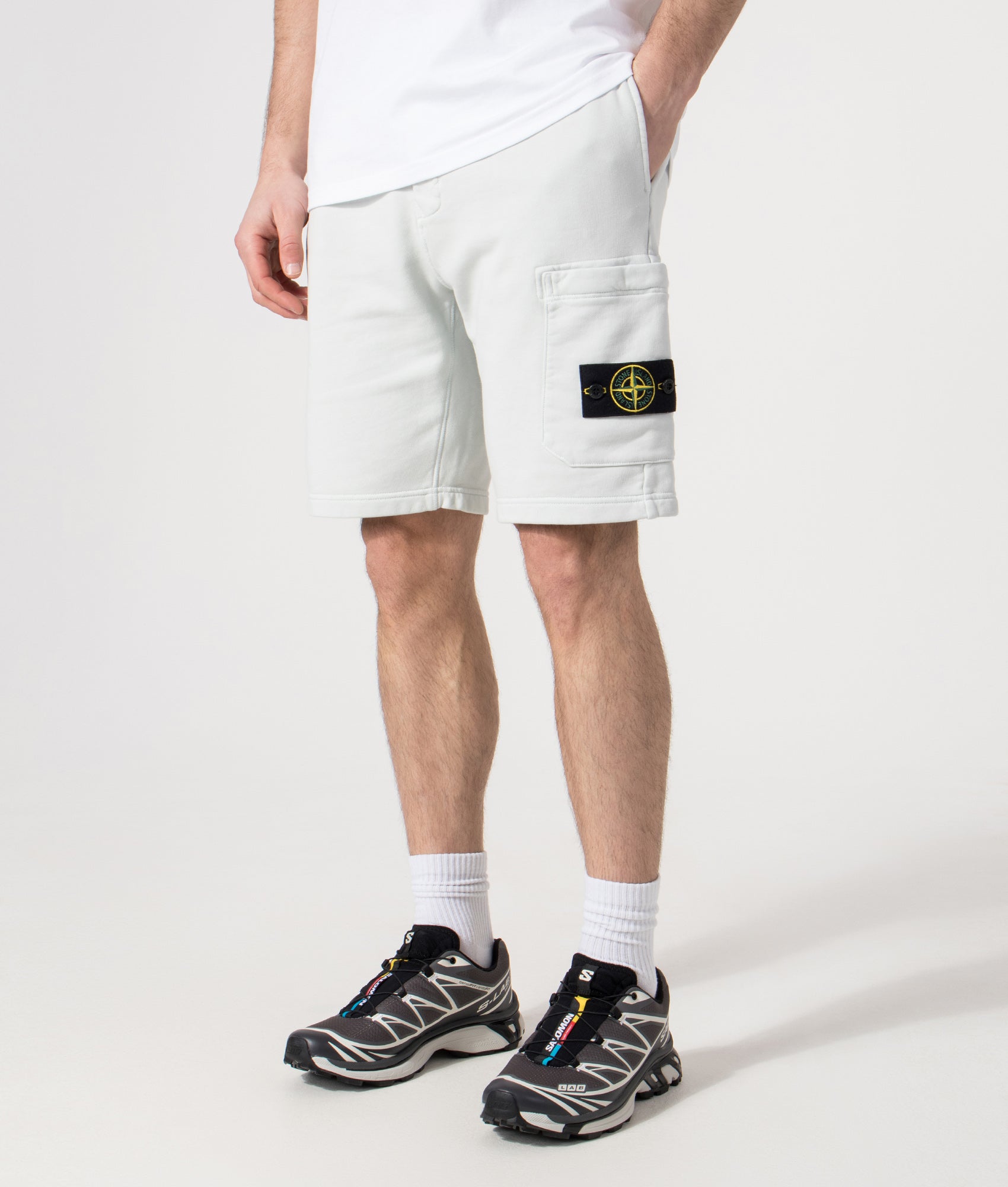 Stone Island Sweat Shorts in Sky Blue at EQVVS Menswear. Angled model front shot.