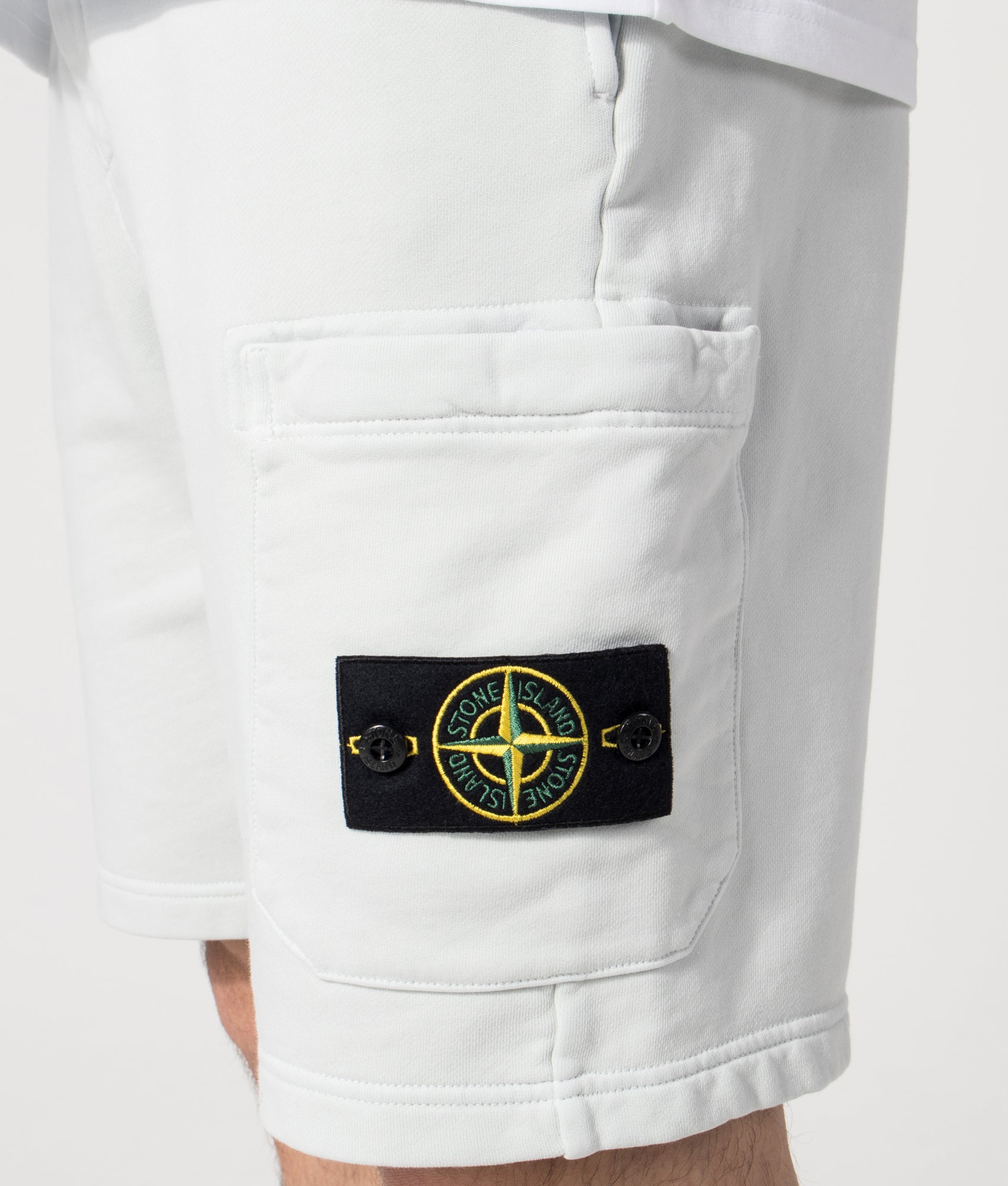 Stone Island Sweat Shorts in Sky Blue at EQVVS Menswear. Detail shot.