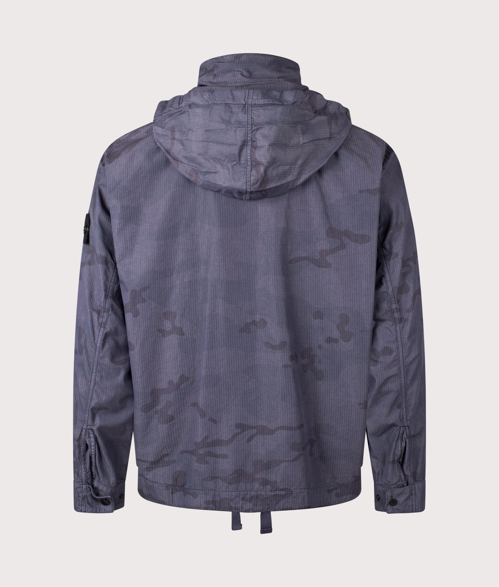 Stone Island Faded Camo Light Ripstop-OVD Field Jacket in Blue Grey at EQVVS Menswear. Back shot with hood.