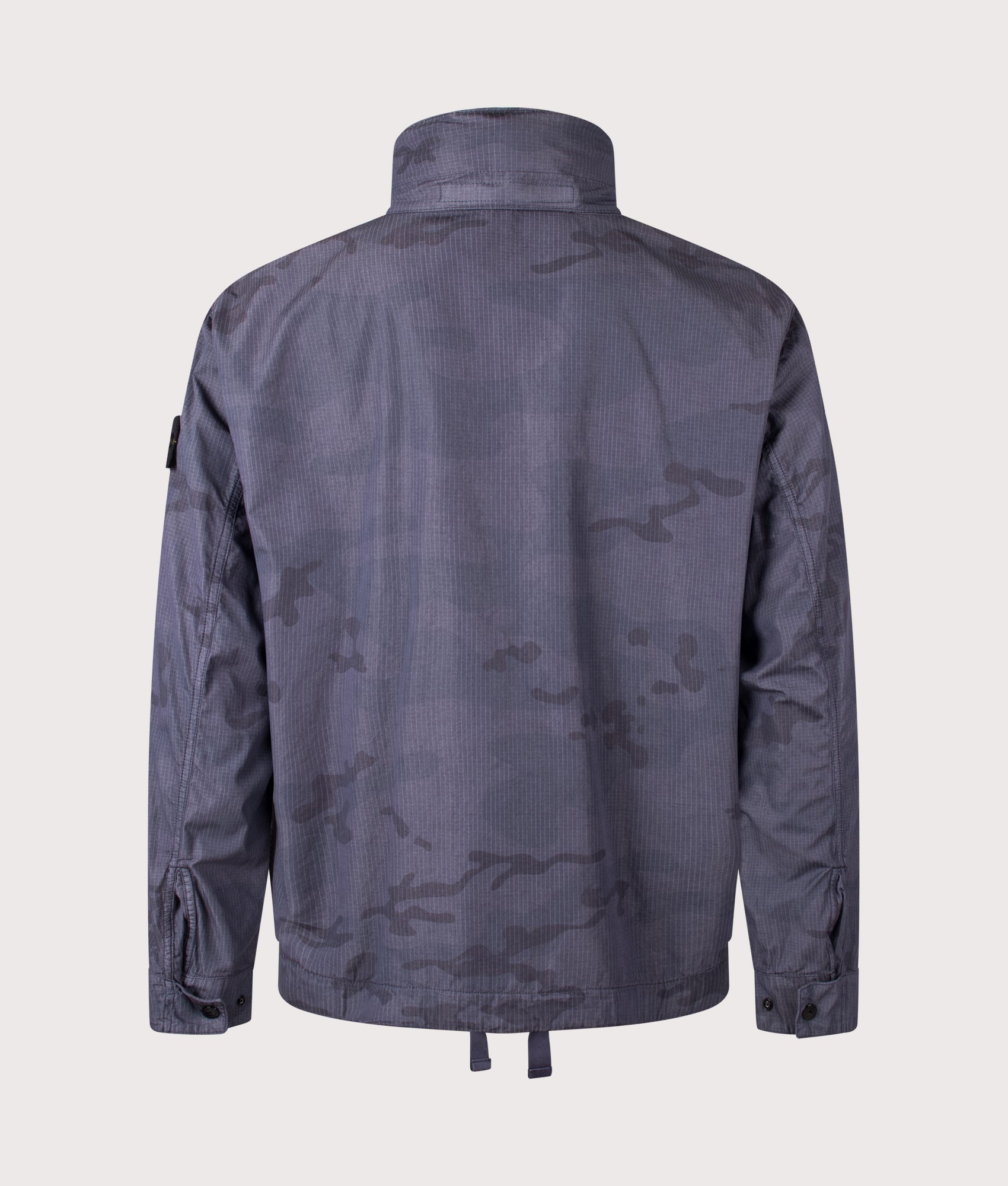 Stone Island Faded Camo Light Ripstop-OVD Field Jacket in Blue Grey at EQVVS Menswear. Back shot without hood.