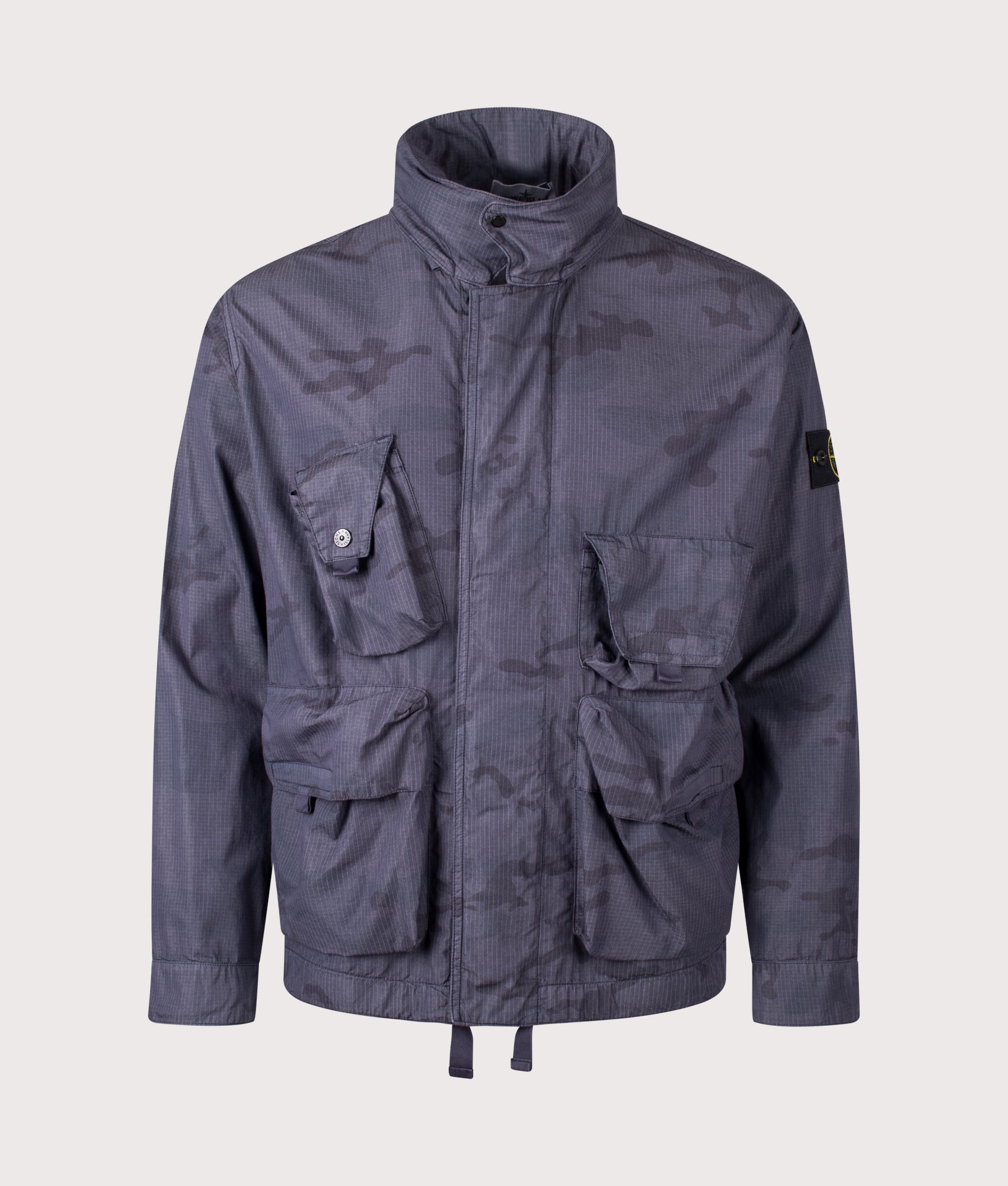 Stone Island Faded Camo Light Ripstop-OVD Field Jacket in Blue Grey at EQVVS Menswear. Front shot.