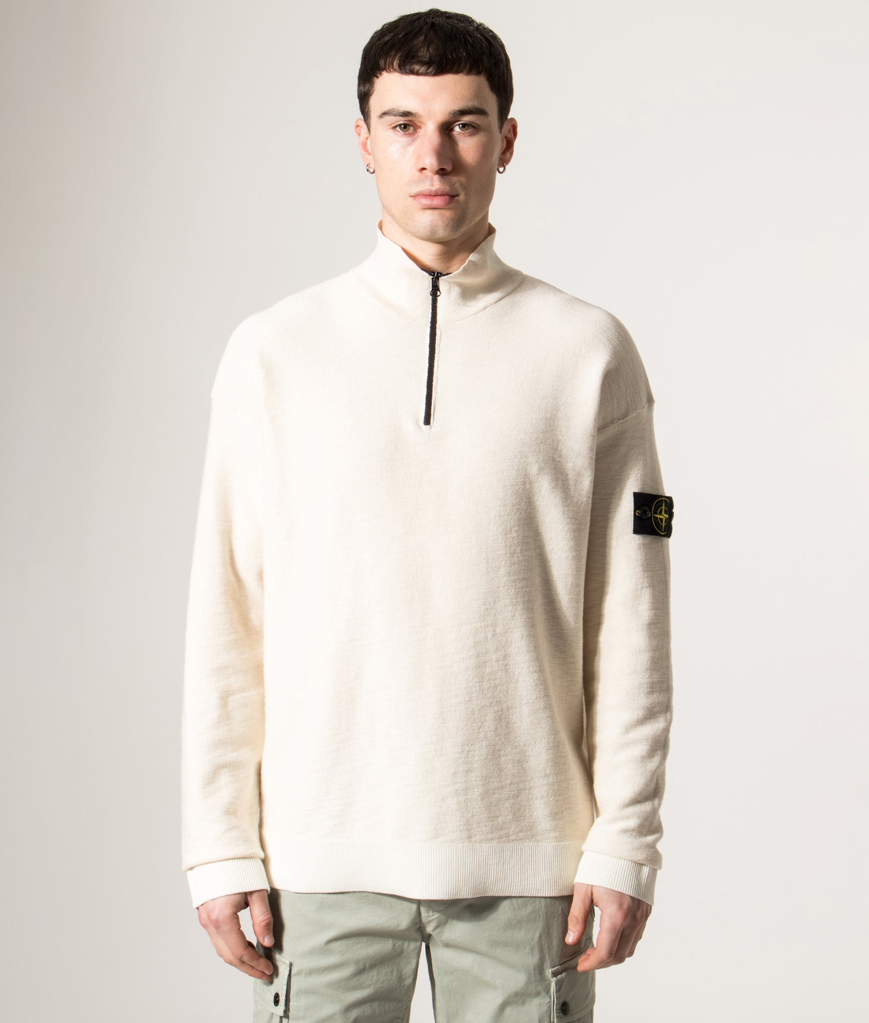 Stone Island Lightweight Quarter Zip Knit in Ivory at EQVVS Menswear. Model shot.