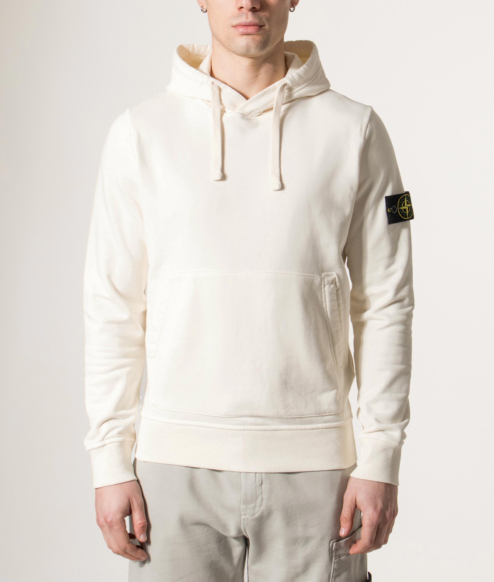 Stone Island Organic Cotton Hoodie in Ivory at EQVVS Menswear. Model front shot.