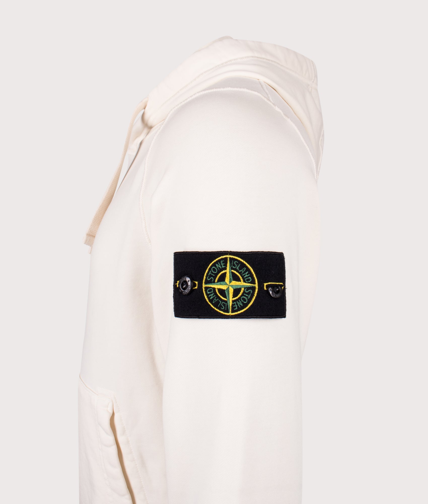Stone Island Organic Cotton Hoodie in Ivory at EQVVS Menswear. Detail shot.