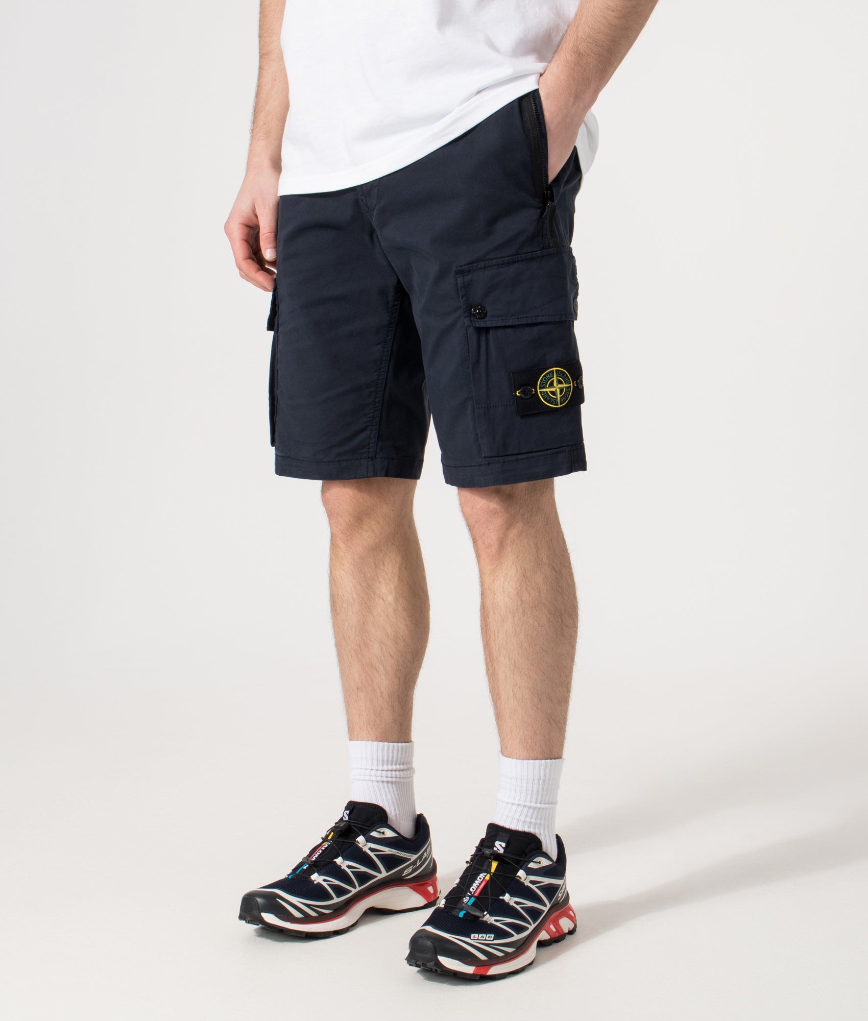 Stone Island Cargo Shorts in Navy at EQVVS Menswear. Angled front shot.