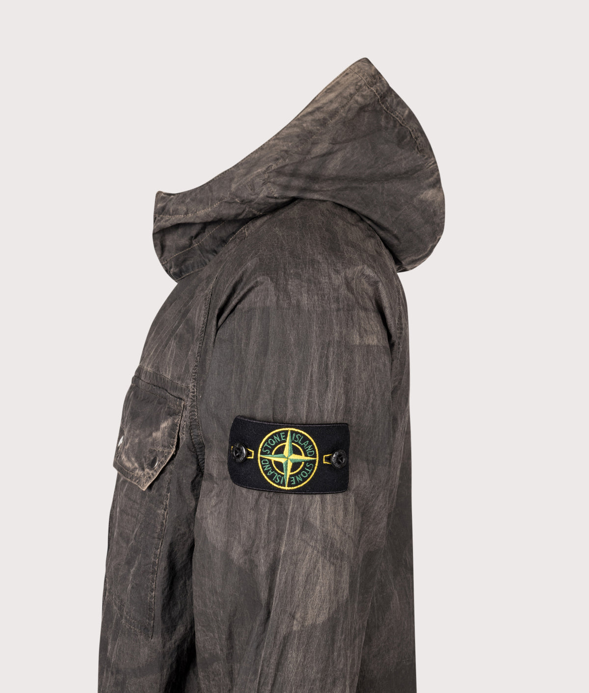 Stone Island Comfort Fit Laser Forest Camo Crinkle Reps-TC Overshirt in Biscuit at EQVVS Menswear. Detail shot.