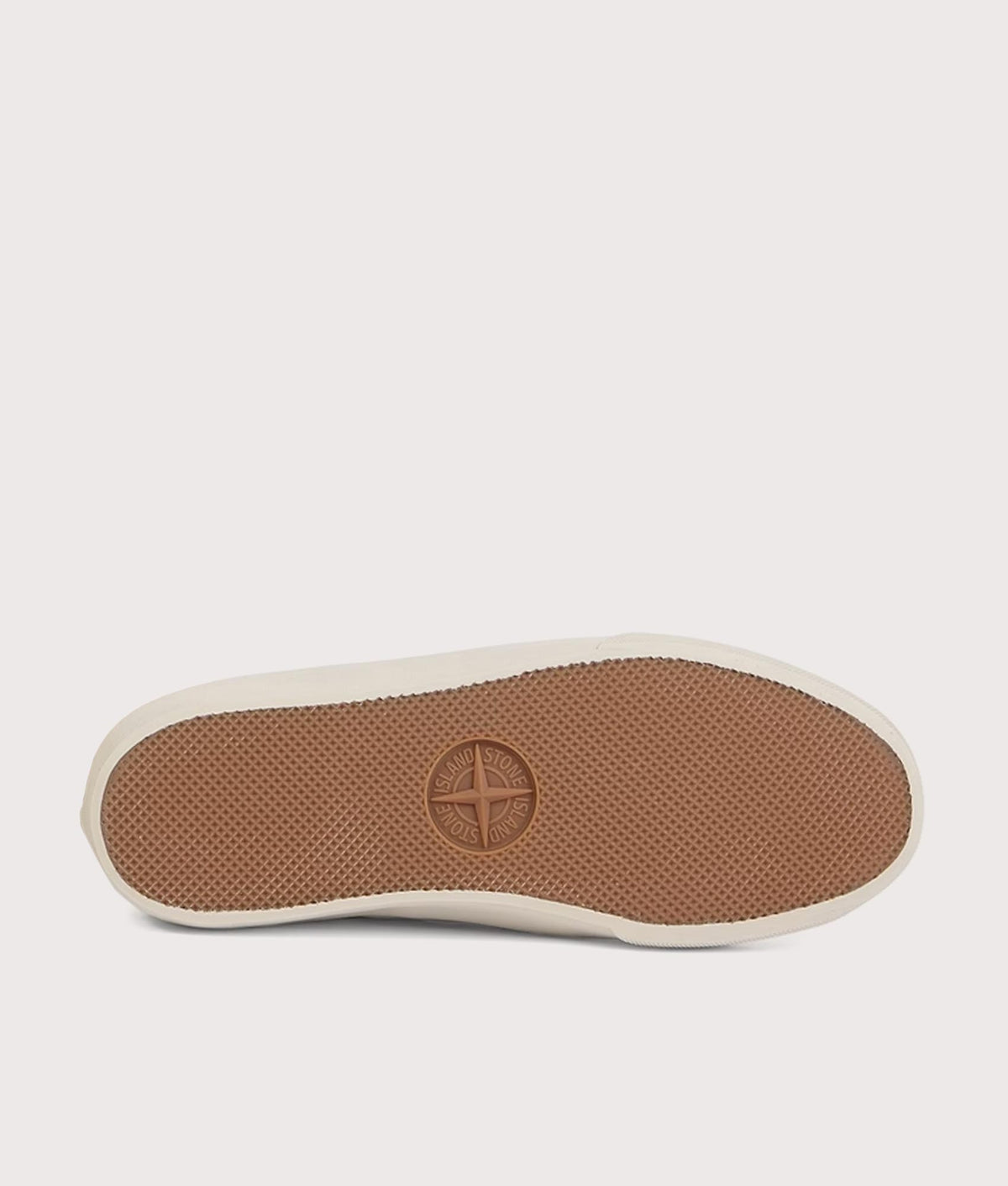 Stone Island Canvas Suede Low Top Trainers in Ivory at EQVVS Menswear. Tread shot.