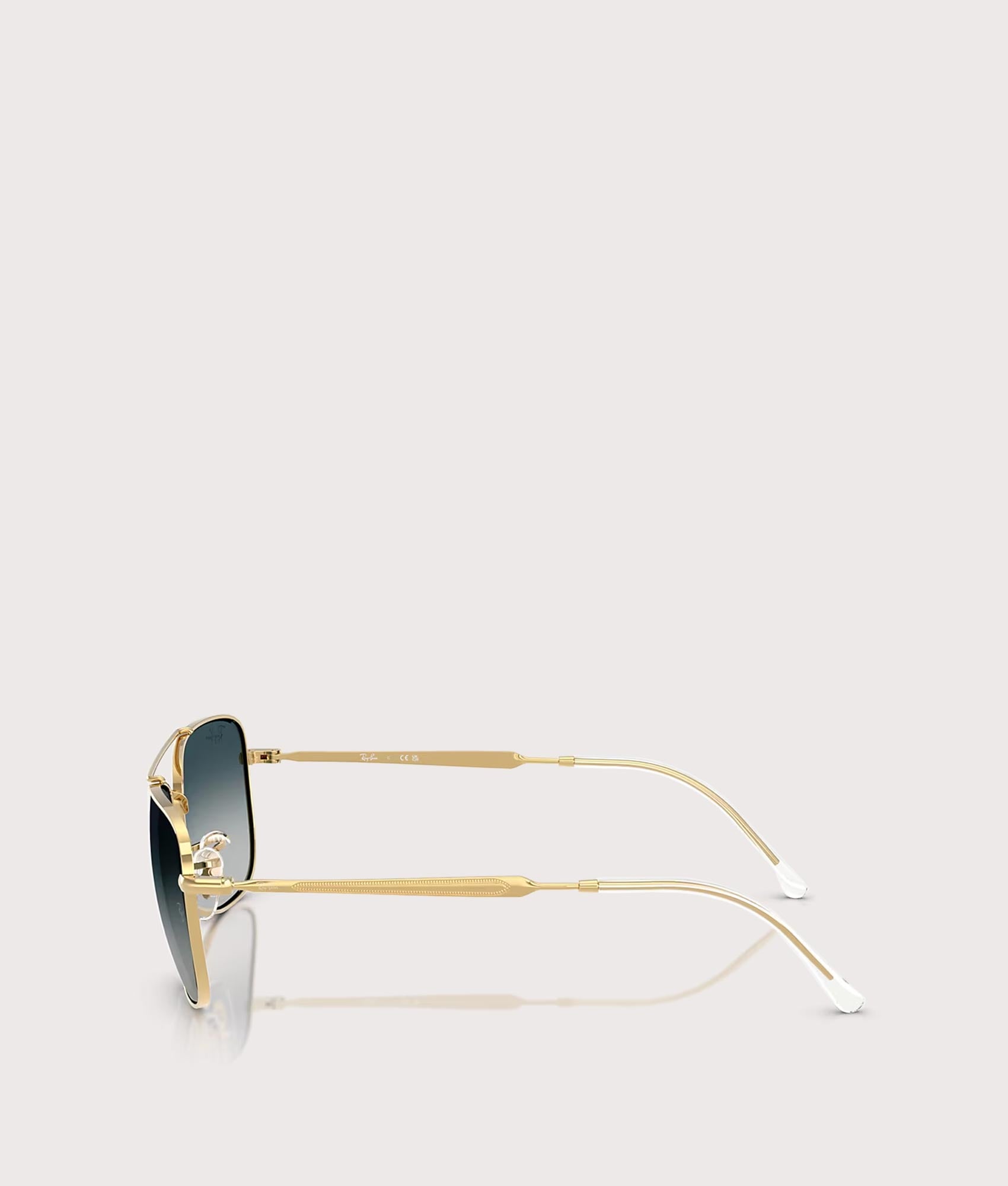 Ray-Ban RB3755 Sunglasses in Polished Arista Gold with Grey Gradient Blue lenses at EQVVS Menswear. Side shot.