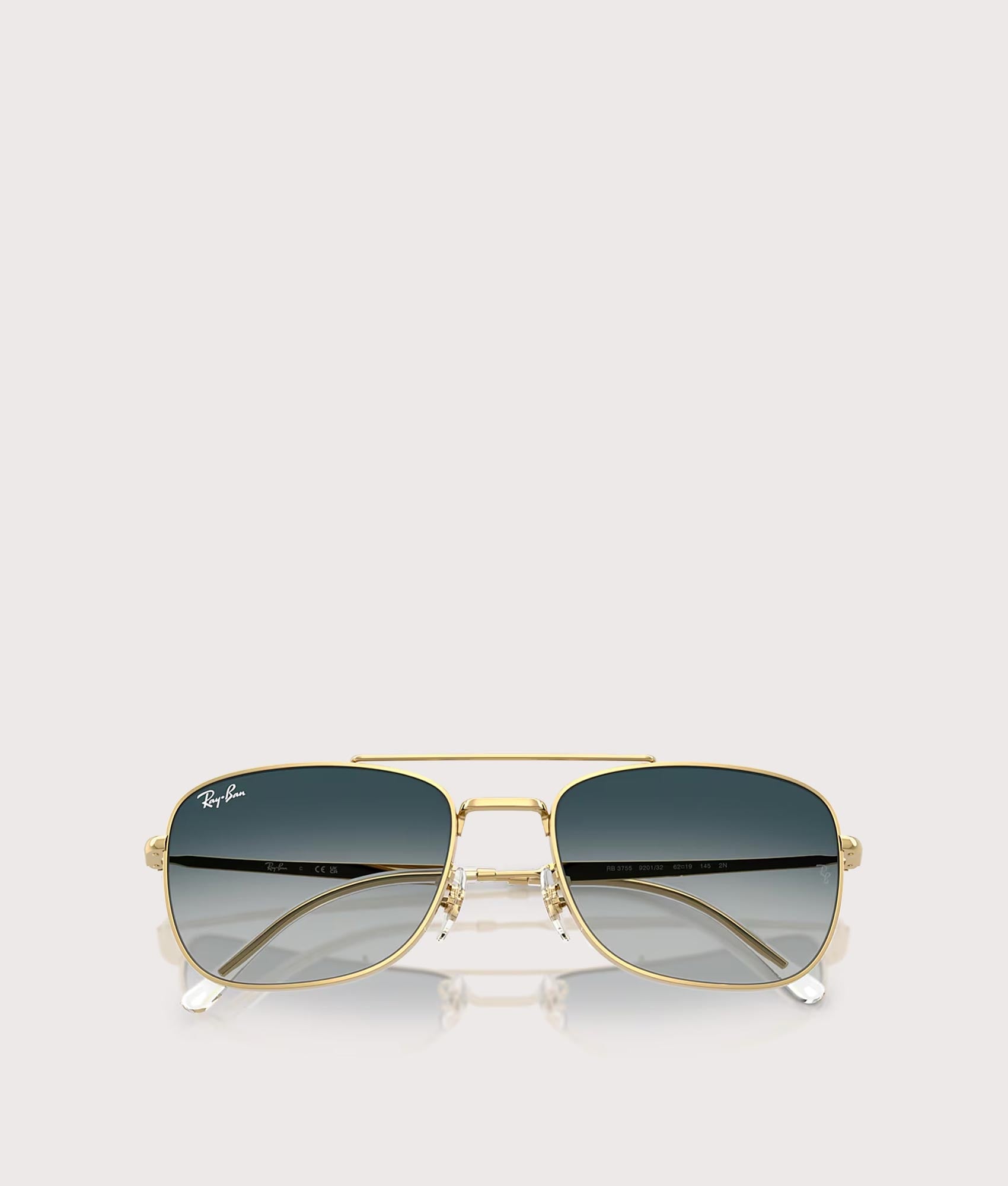 Ray-Ban RB3755 Sunglasses in Polished Arista Gold with Grey Gradient Blue lenses at EQVVS Menswear. Folded shot.