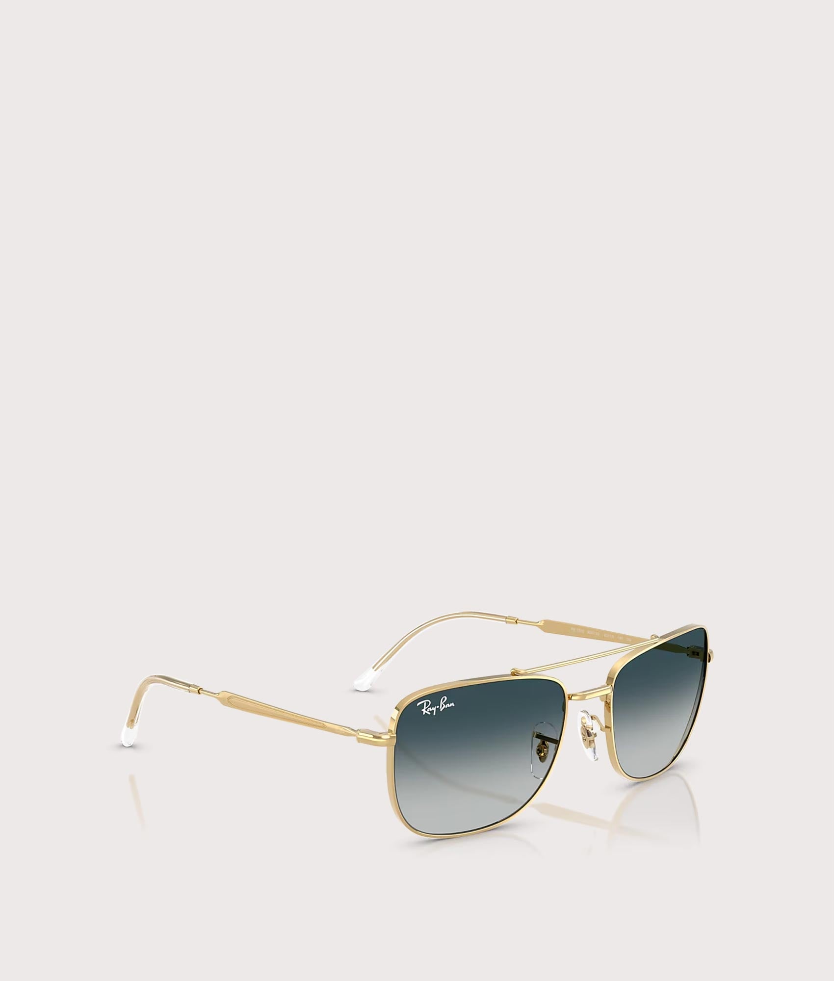 Ray-Ban RB3755 Sunglasses in Polished Arista Gold with Grey Gradient Blue lenses at EQVVS Menswear. Angled front shot.