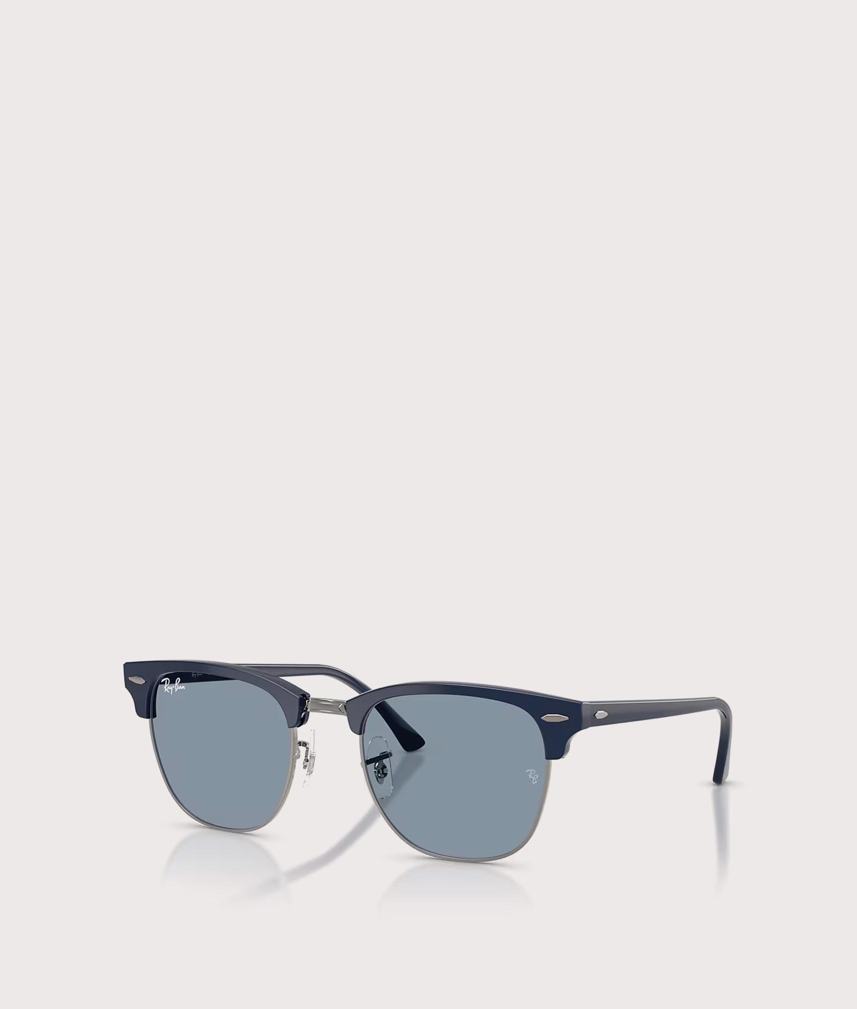 Clubmaster Classic Sunglasses in Matte Blue & Gunmetal-Blue Lens by Ray-Ban. Shot by EQVVS. Front angled shot.