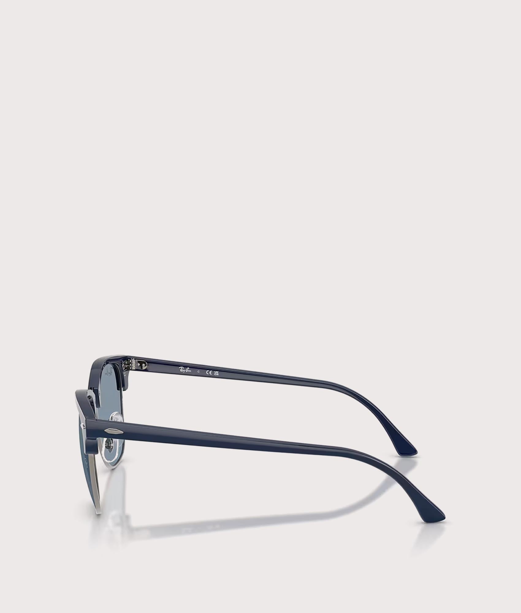 Clubmaster Classic Sunglasses in Matte Blue & Gunmetal-Blue Lens by Ray-Ban. Shot by EQVVS. Side shot.