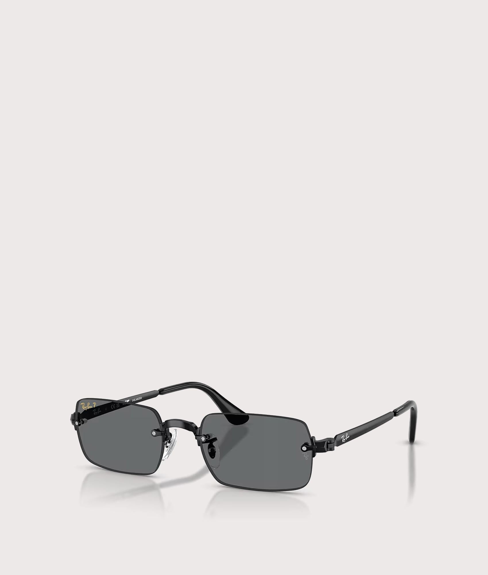 Ray-Ban RB3928 By A$AP Rocky Sunglasses in Polished Black colourway with Dark Grey Polarized lens at EQVVS Menswear. Angled front shot. 