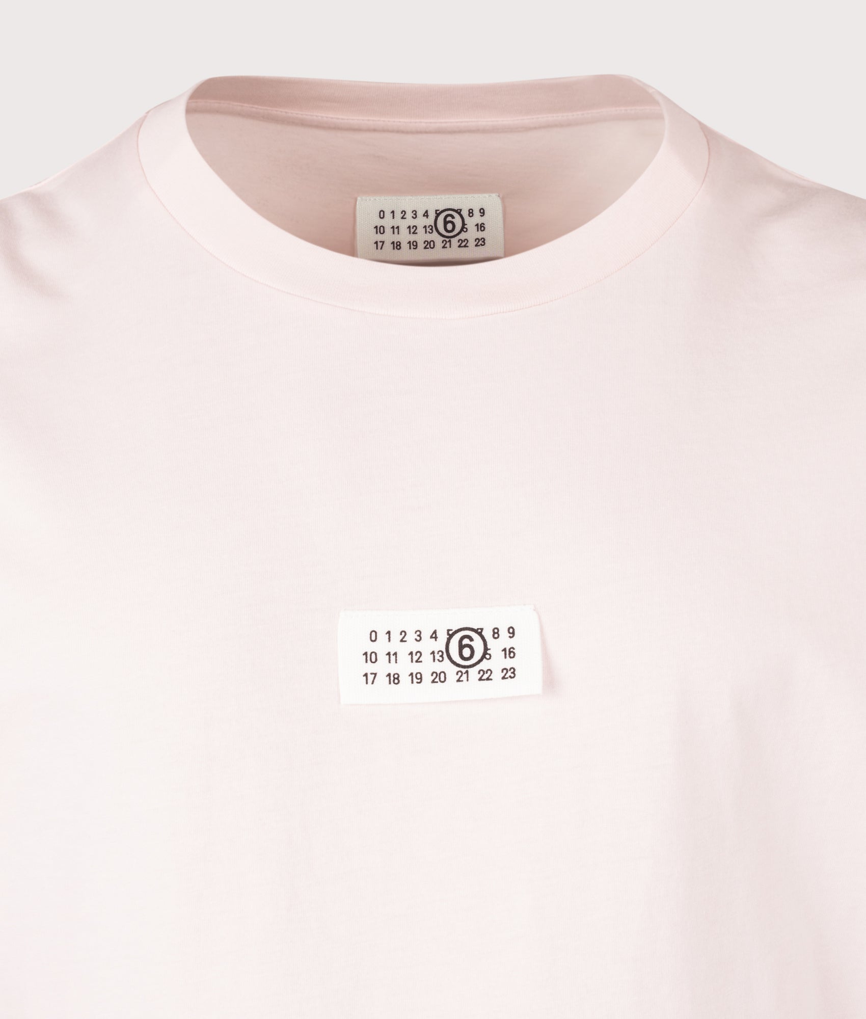 MM6 Maison Margiela Numeric Cotton T-Shirt in Pink at EQVVS Menswear. Detail shot.