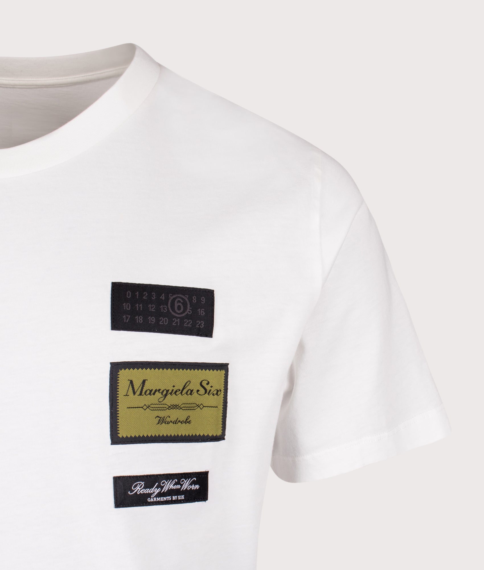 MM6 Maison Margiela Label Patch T-Shirt in Off White at EQVVS Menswear. Detail shot. 