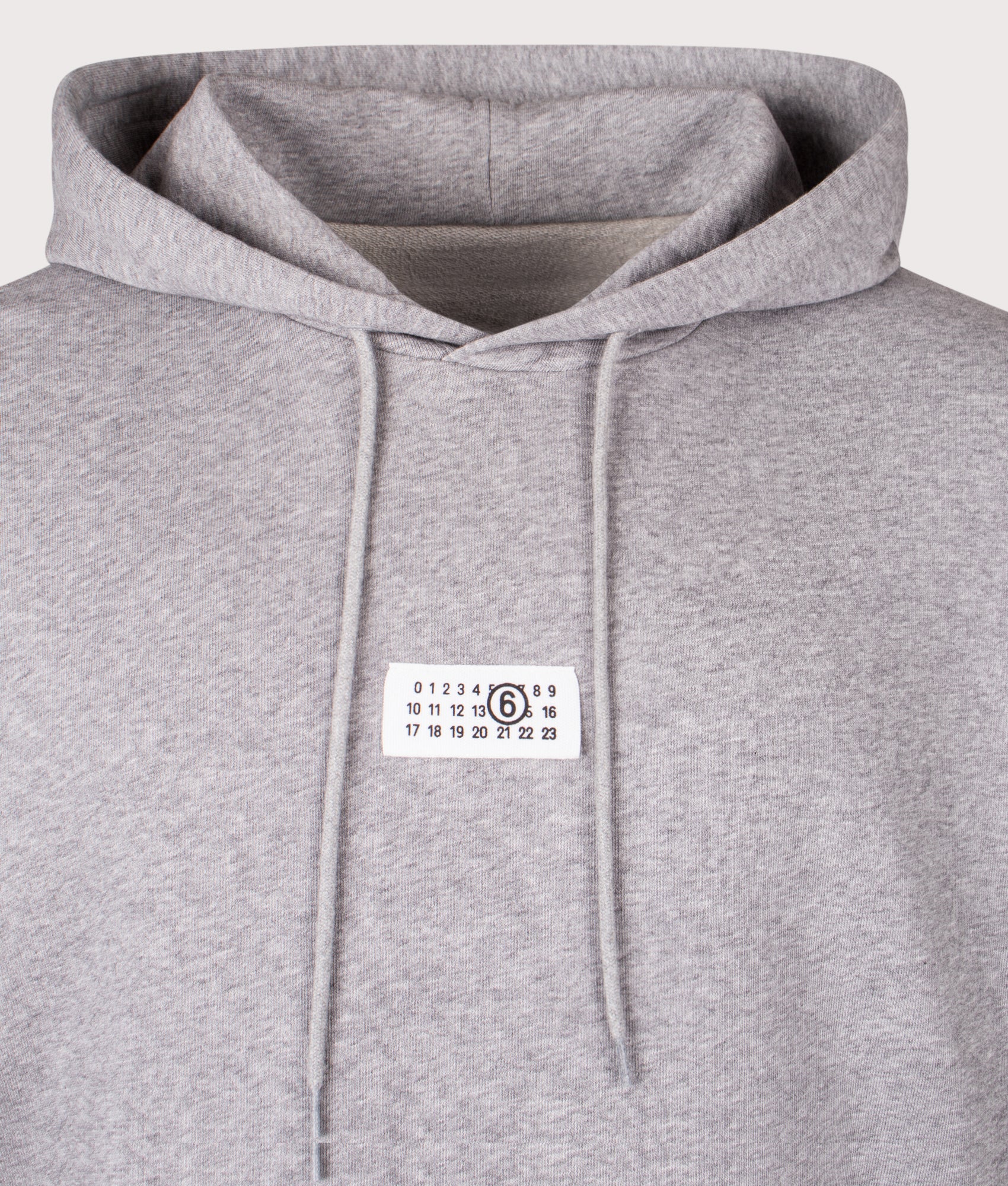 MM6 Maison Margiela Numeric Sweatshirt in Light Grey Melange at EQVVS Menswear. Detail shot.