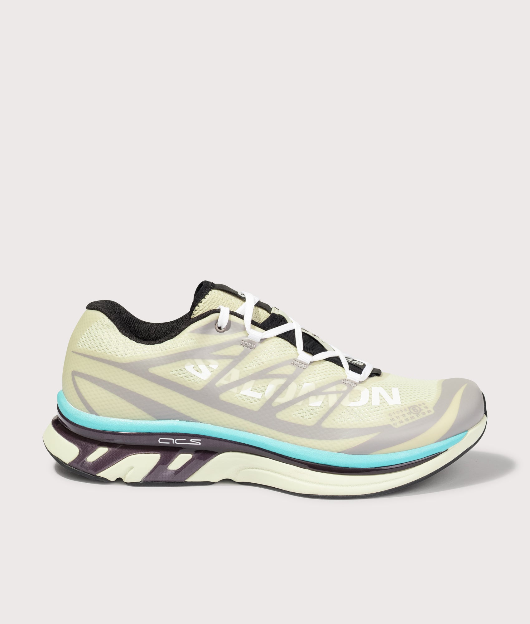 MM6 X Salomon XT Sneakers in Asparagus Green/Gull/Blue Curacao by MM6 Maison Margiela. Shot by EQVVS. Front shot.