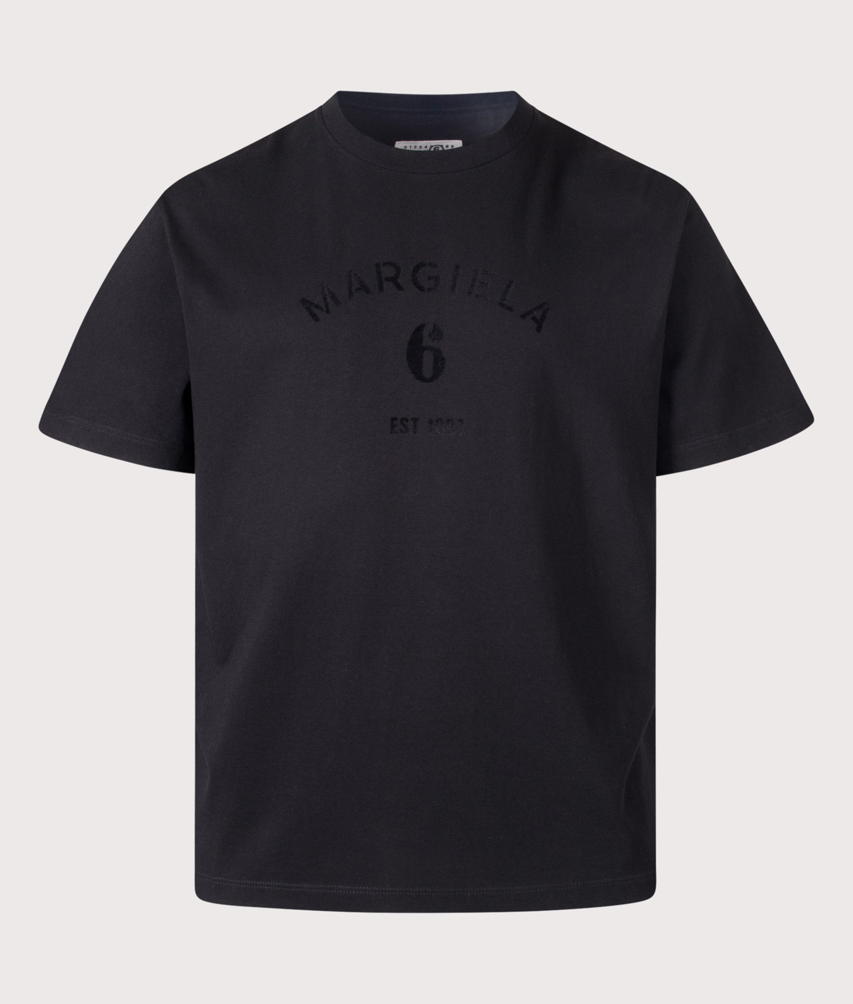 MM6 Maison Margiela Relaxed Fit Six Print T-Shirt in Black at EQVVS Menswear. Front shot.