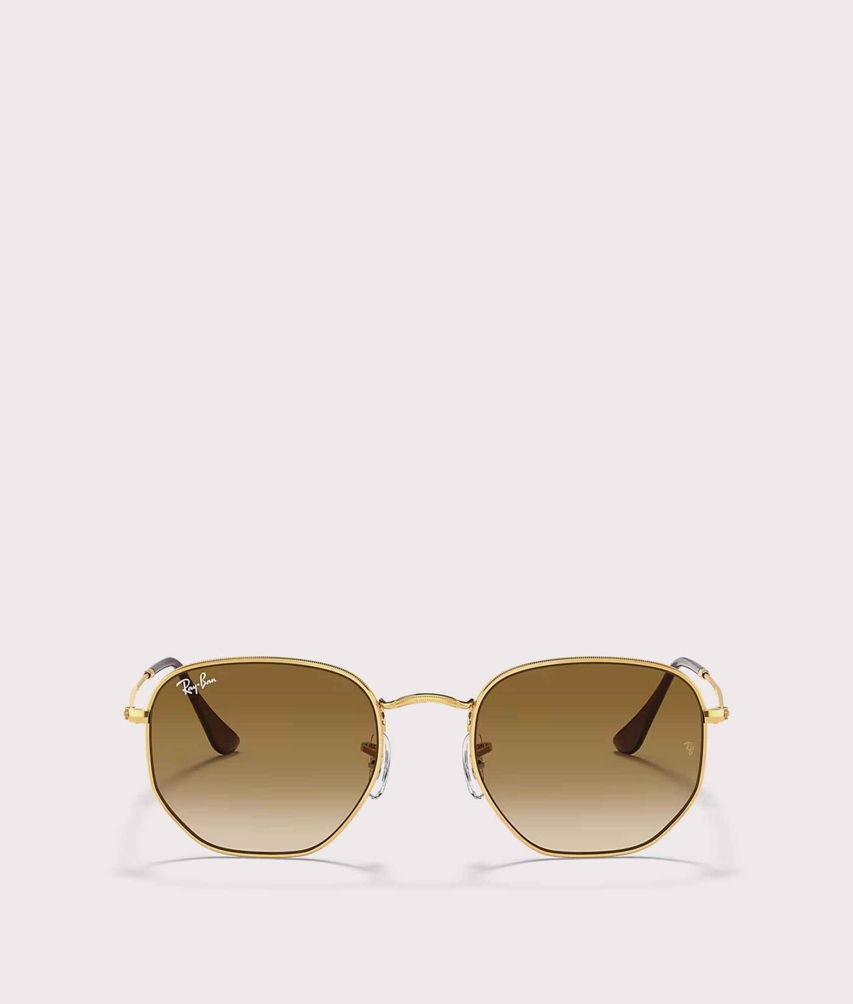 Hexagonal Flat Lens Sunglasses in Polished Arista Gold-Brown Lens by Ray-Ban. Shot by EQVVS. Front shot.
