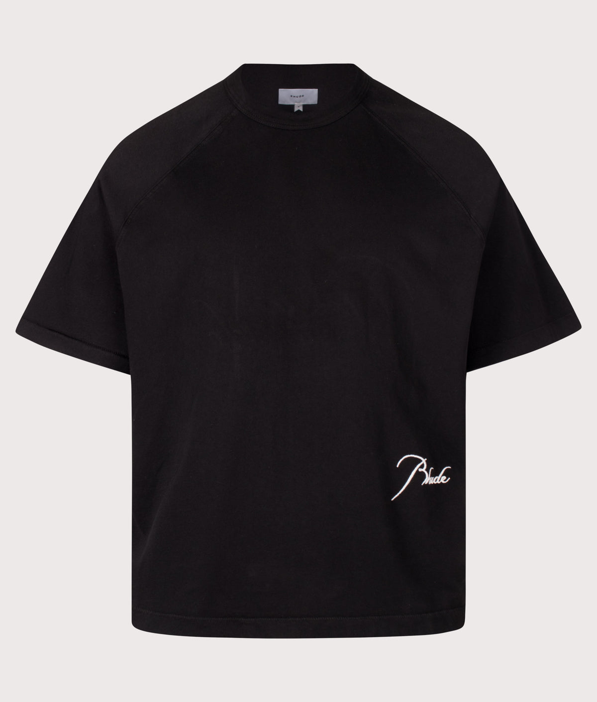 RHUDE Oversized Fit Classique Raglan T-Shirt in Black and White at EQVVS Menswear. Front shot.