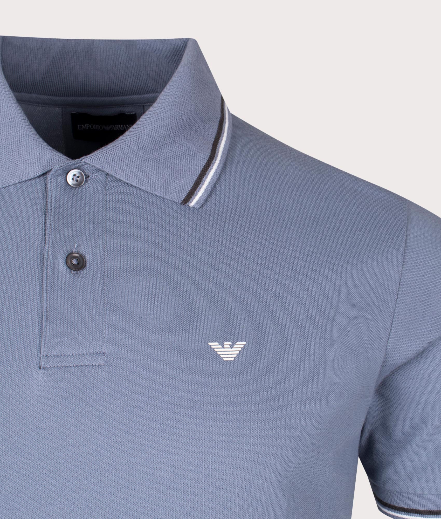 Essential Stretch Pique Polo Shirt in Pietra Focaia by Emporio Armani. EQVVS Detail Shot.