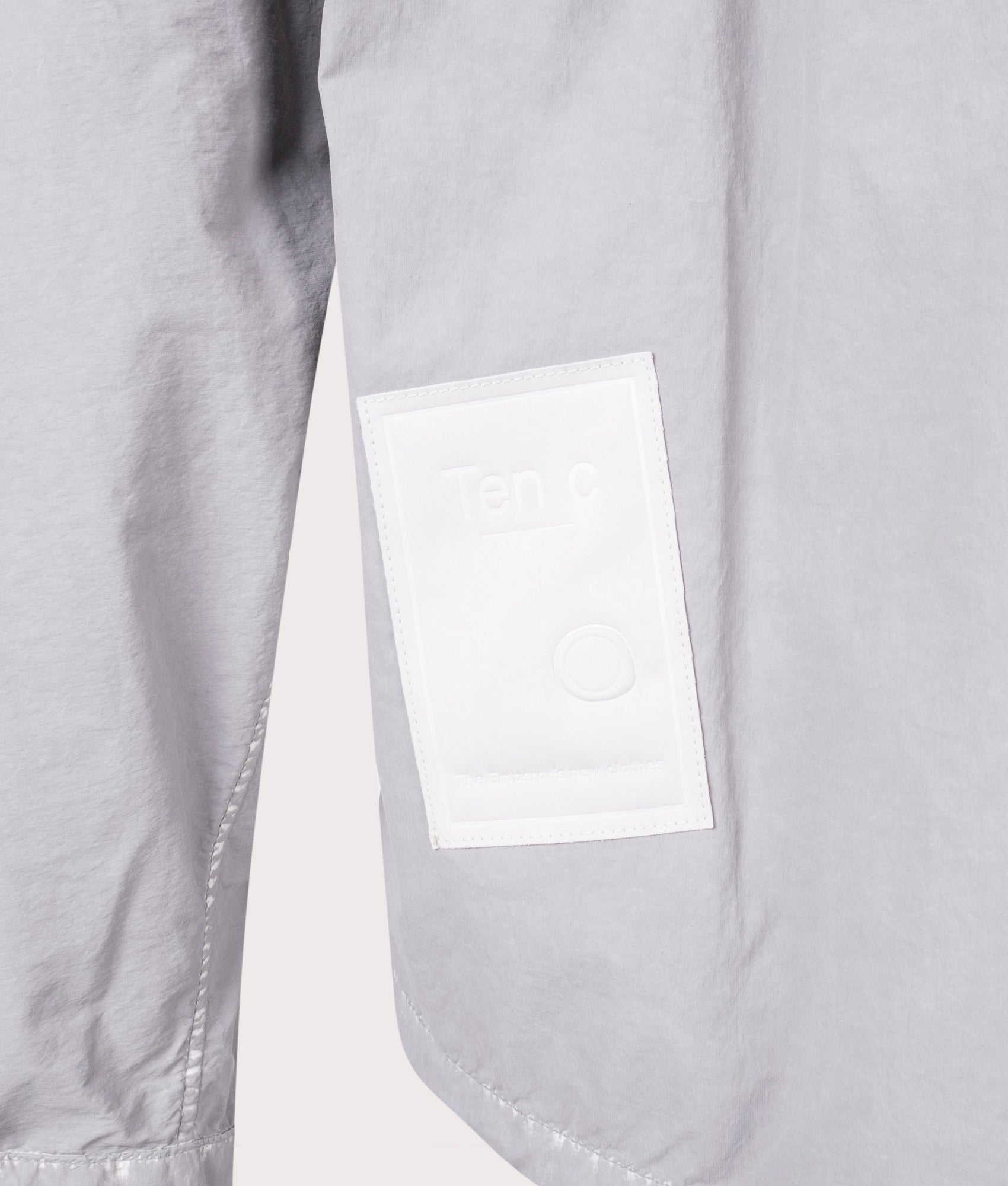 Shadow Dyed Short Jacket in Pale Taupe by Ten C at EQVVS Menswear. Detail Shot.