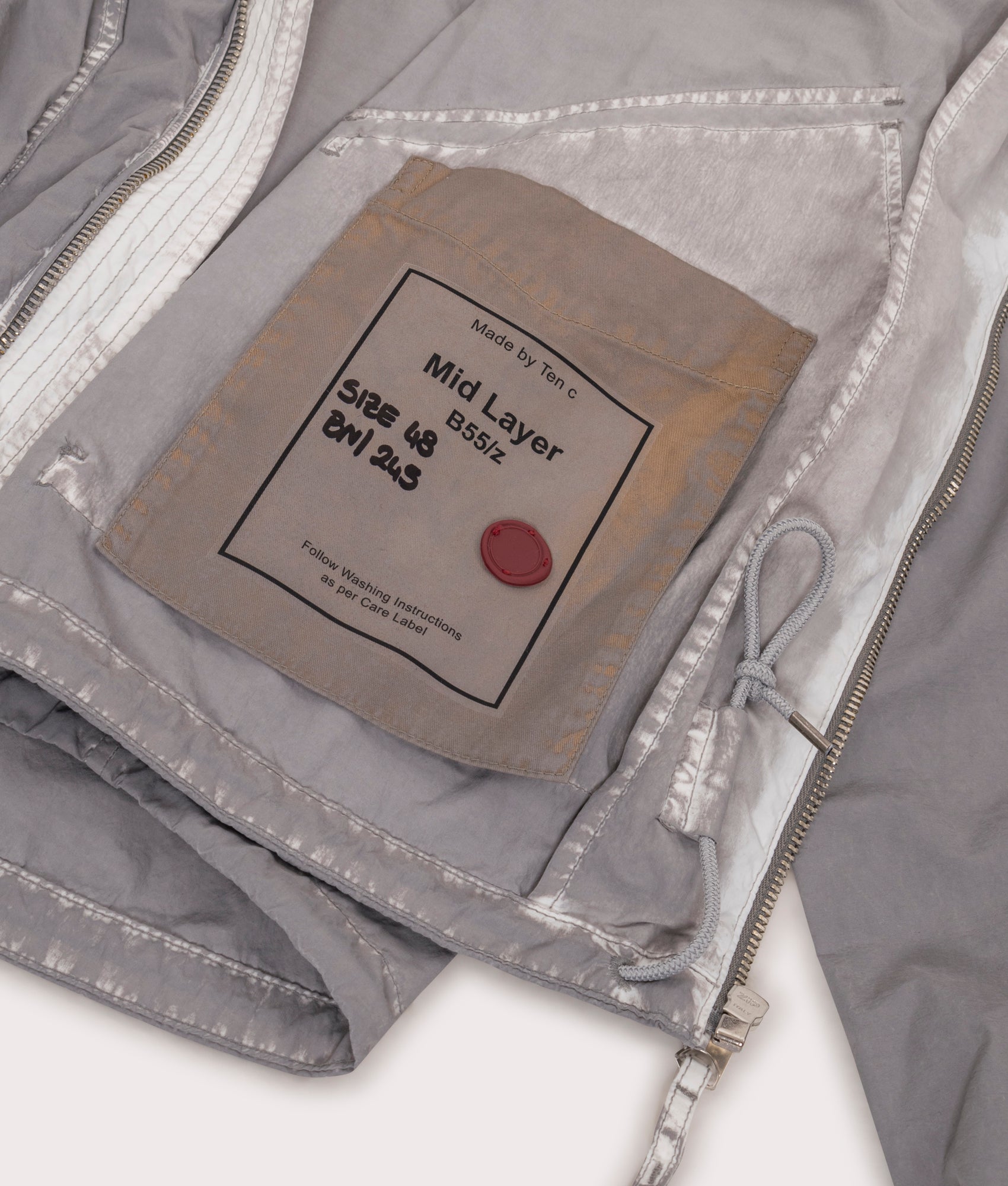 Shadow Dyed Short Jacket in Pale Taupe by Ten C at EQVVS Menswear. Inside Detail Shot.