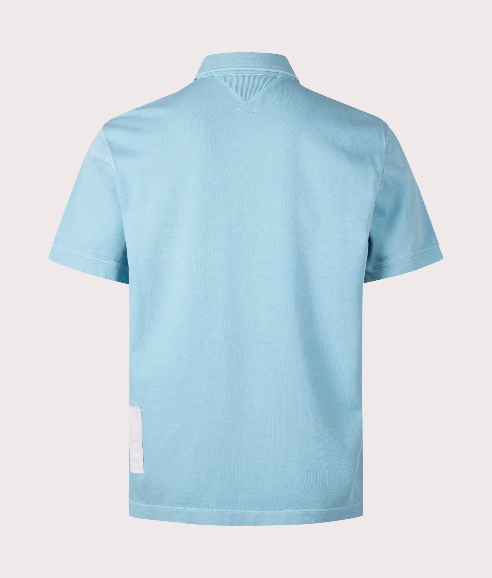 Ten c Mineral Garment Dyed Polo Shirt in Sky Blue Lake, 100% Cotton at EQVVS. Back shot.