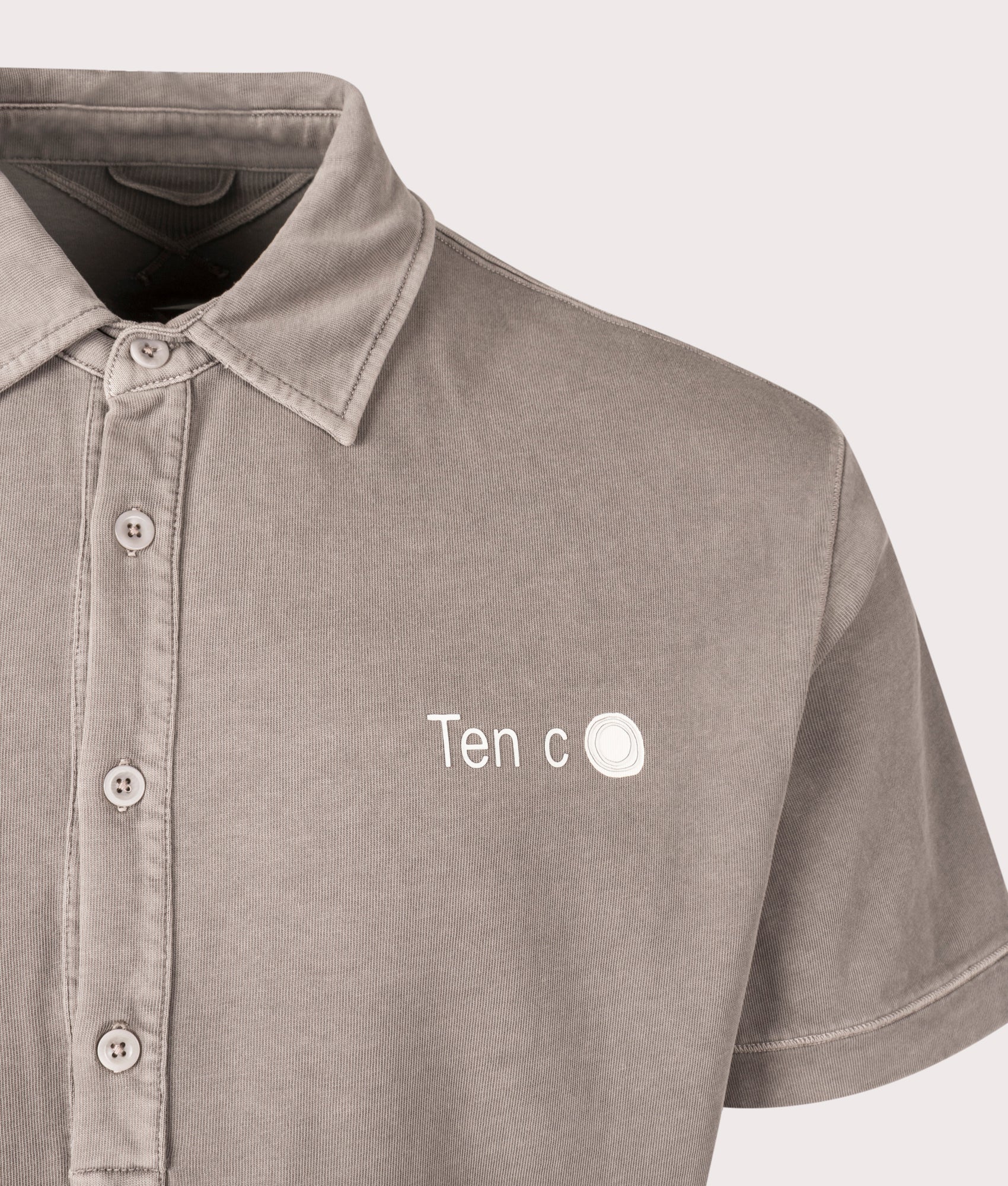 Mineral Garment Dyed Polo Shirts in Iron Grey by Ten C at EQVVS Menswear. Detail Shot.