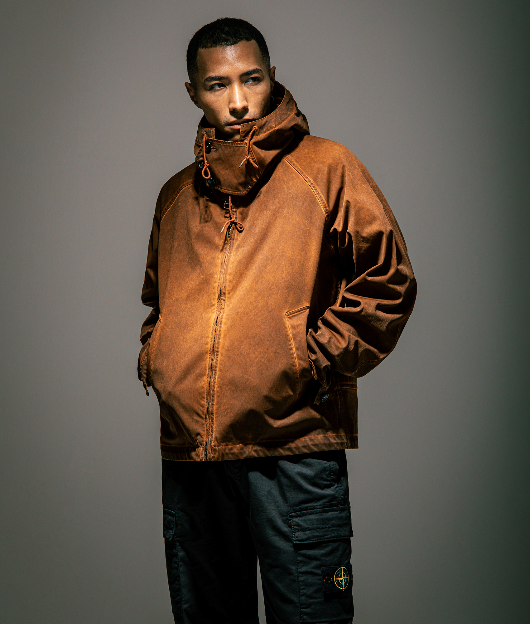 Fade Dyed Anorak Jacket by Ten c in Brown. Shot by EQVVS. Campaign shot.