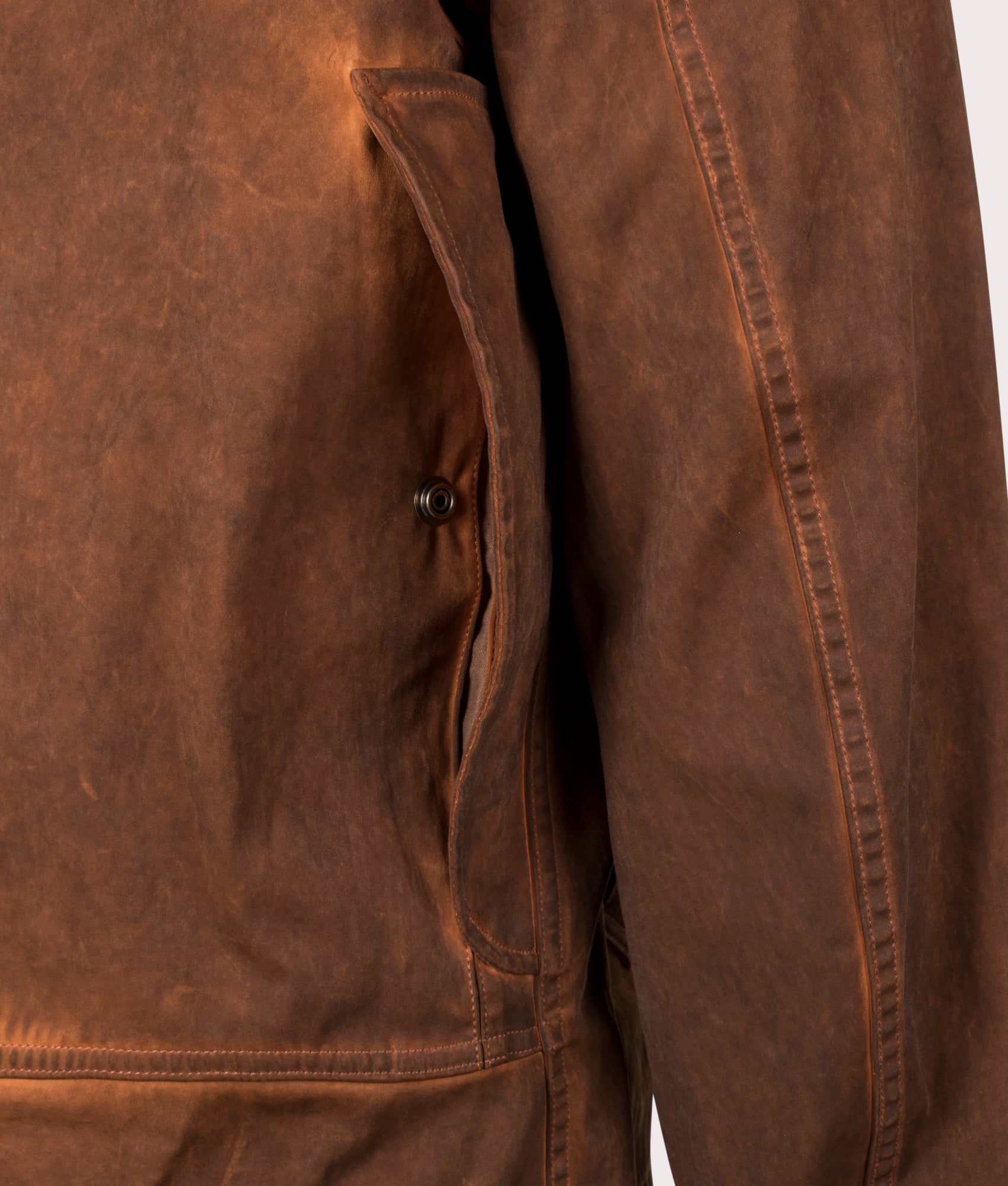 Fade Dyed Anorak Jacket by Ten c in Brown. Shot by EQVVS. Back detail shot.