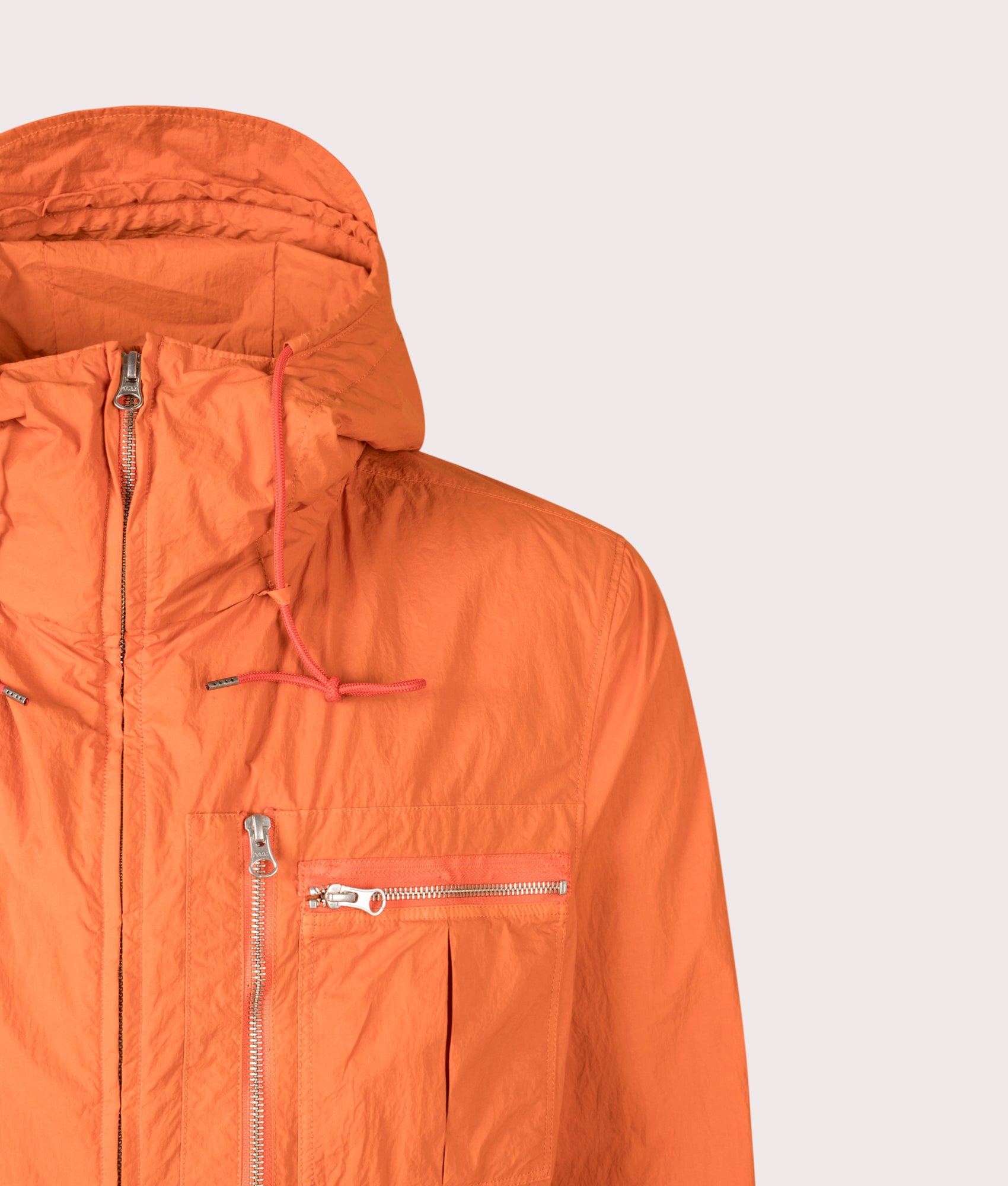 Ten c Garment Dyed Nylon Tactel Lined Jacket by in Orange Koi Carp at EQVVS Menswear. Front detail shot.