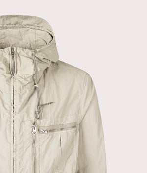 Garment Dyed Nylon Tactel Lined Jacket by Ten c in Pale Taupe. Shot by EQVVS. Detail shot.