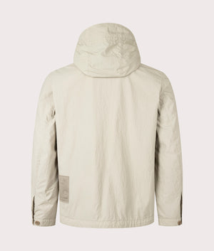 Garment Dyed Nylon Tactel Lined Jacket by Ten c in Pale Taupe. Shot by EQVVS. Back shot.