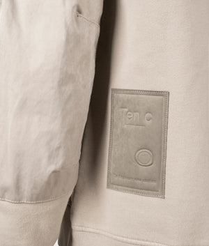 Felpa Chiusa Cappuccio Sweatshirt by Ten c in Pale Taupe. Shot by EQVVS. Detail shot.
