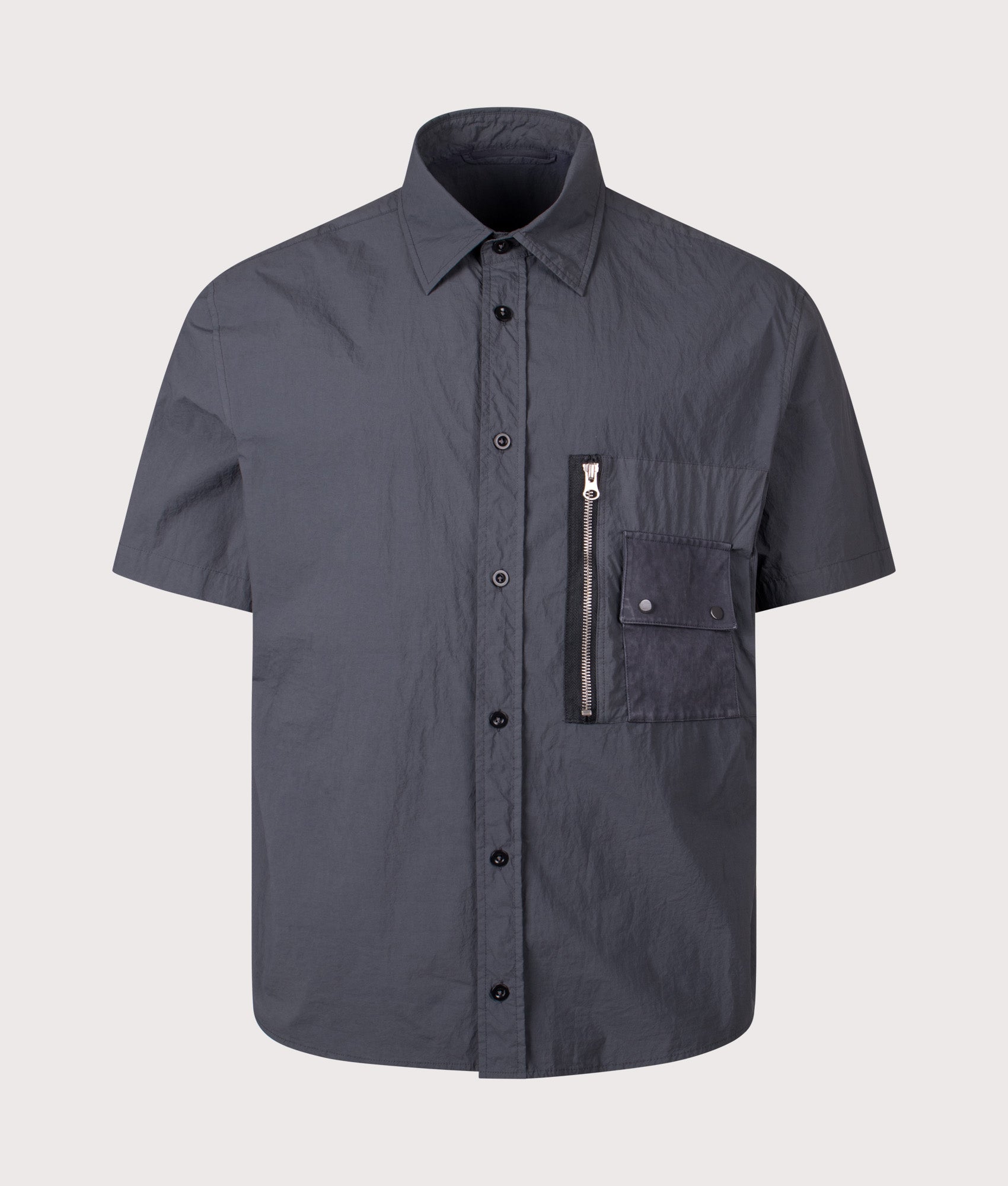 Ten c Garment Dyed Tactel Short Sleeve Shirt in Carbon Grey at EQVVS Menswear. Front shot.