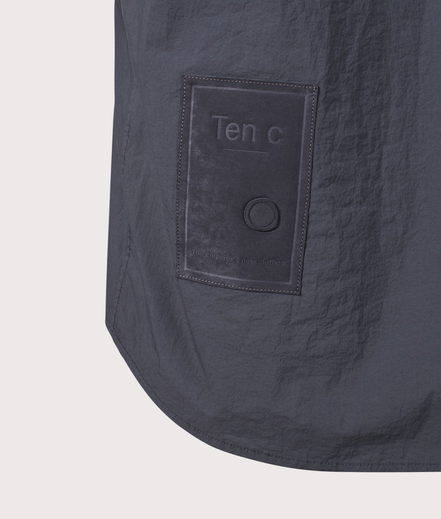 Ten c Garment Dyed Tactel Short Sleeve Shirt in Carbon Grey at EQVVS Menswear. Detail shot.