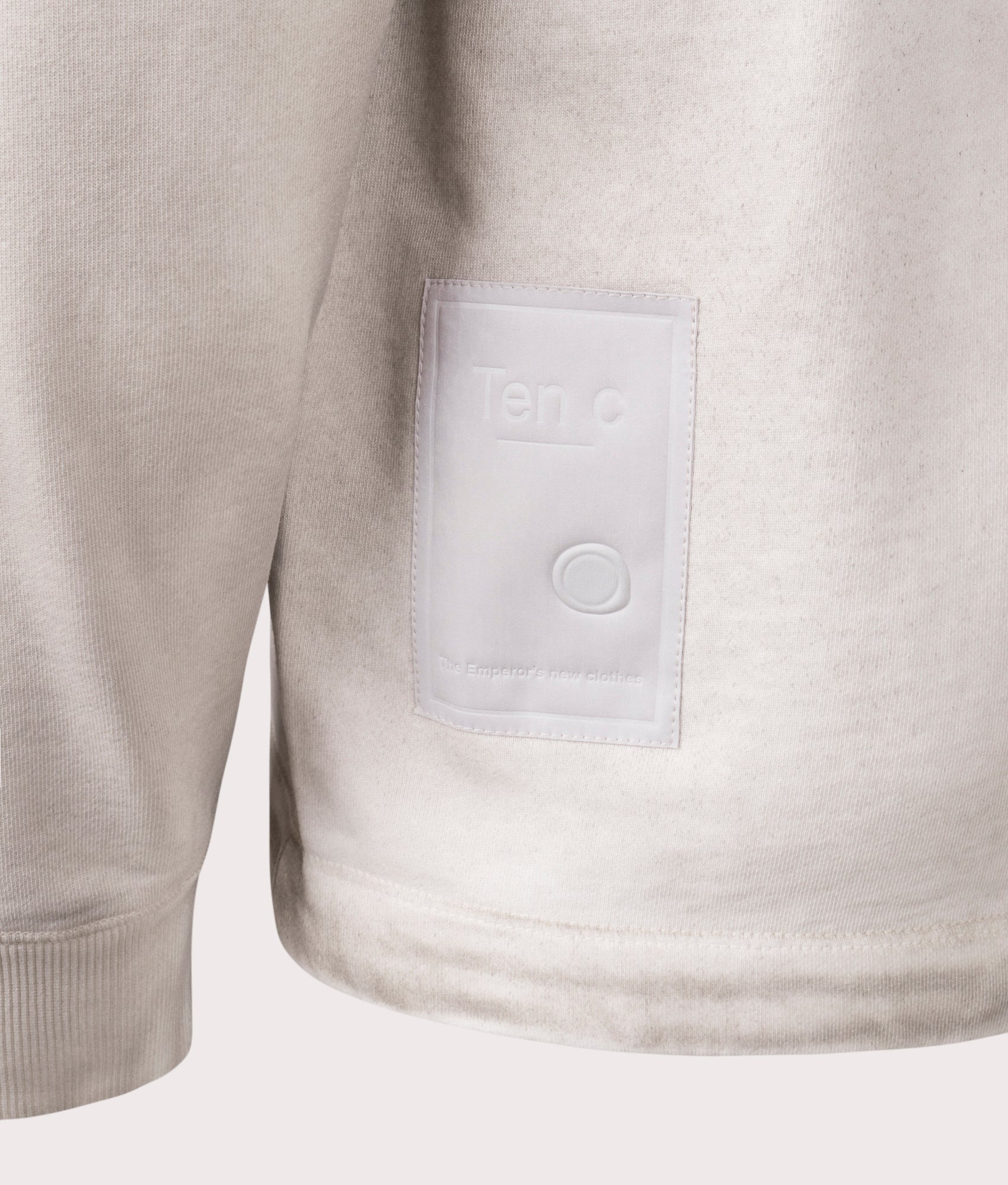 Ten c Airbrushed Garment Dyed Sweatshirt in Pale Taupe, 100% Cotton at EQVVS. Close-up shot. 