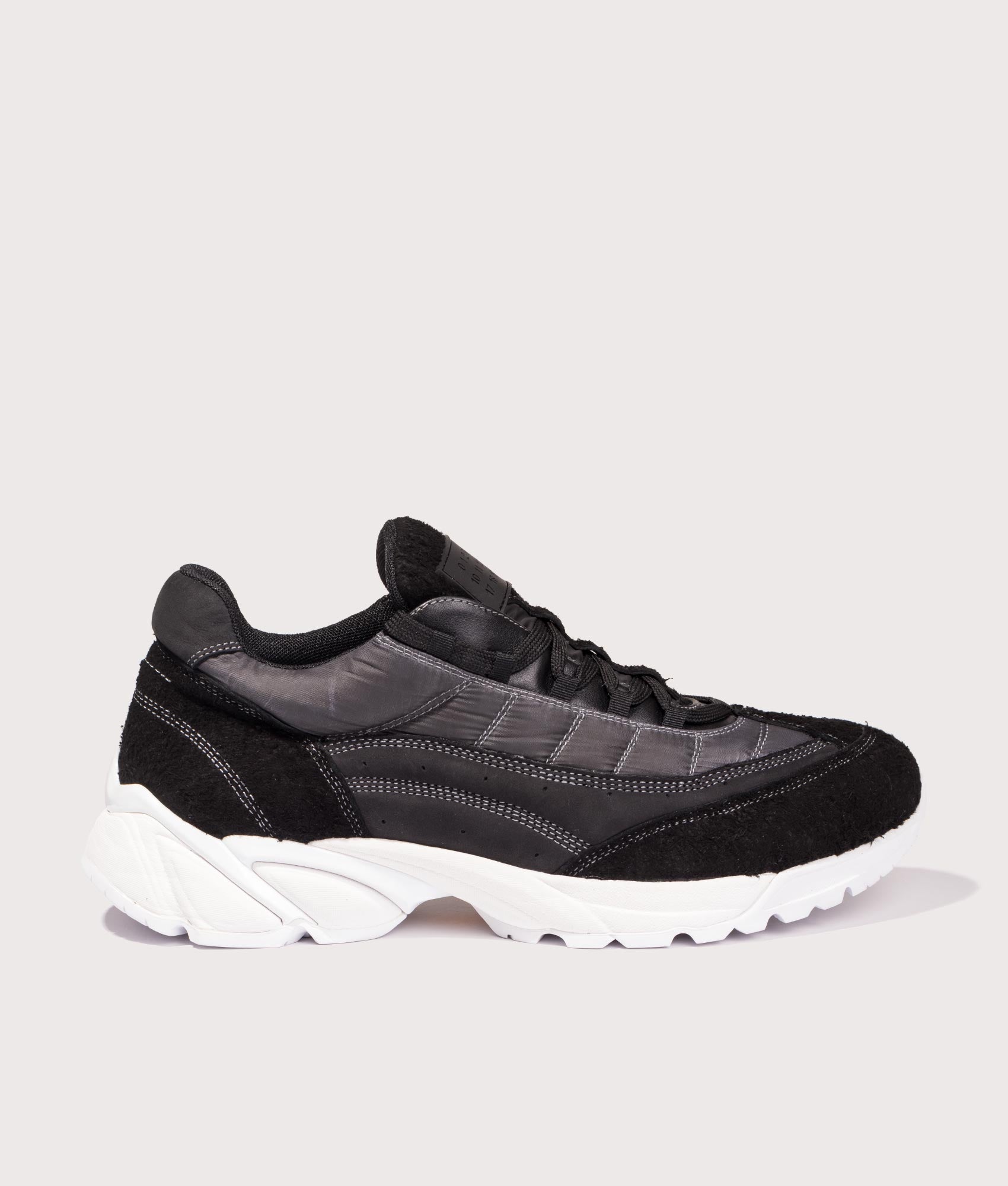 MM6 Sport Sneakers by MM6 in Black. Shot by EQVVS. Front shot.