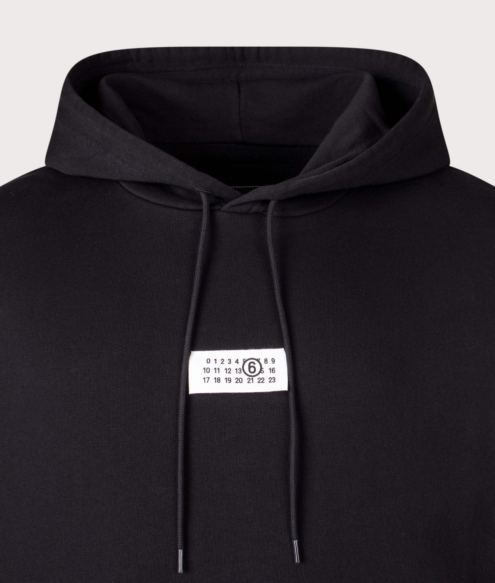 MM6 Maison Margiela  Numeric Sweatshirt in Black at EQVVS Menswear. Detail shot.
