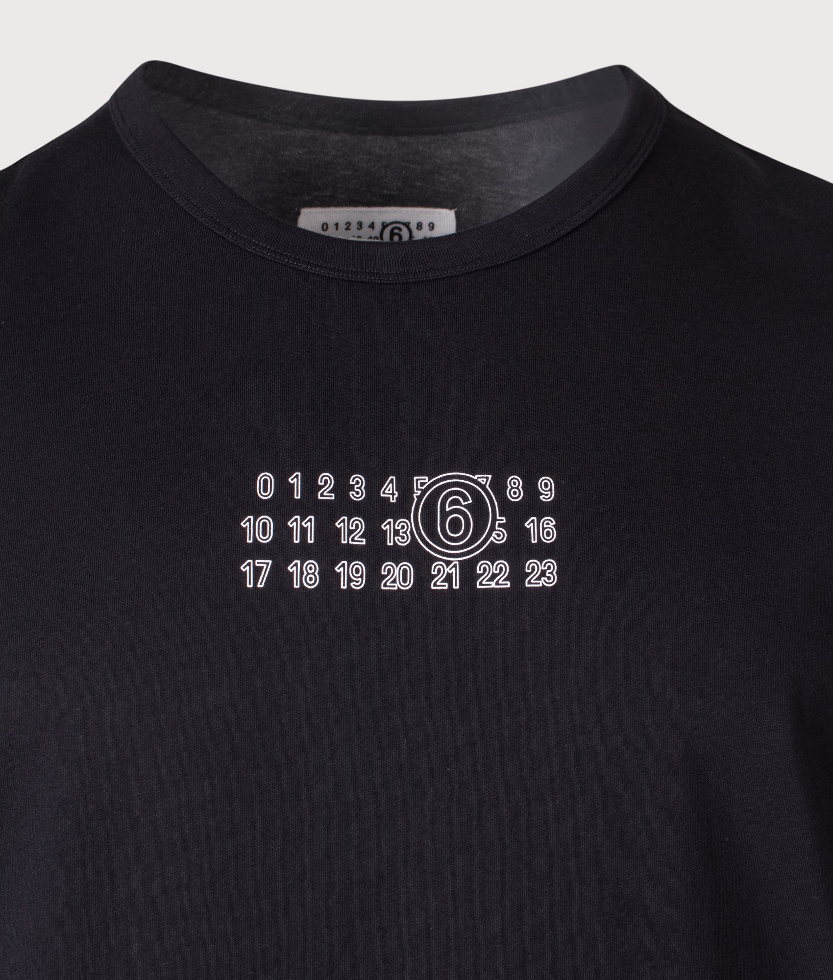 Numeric T-Shirt. Shot by EQVVS. Front detail shot.