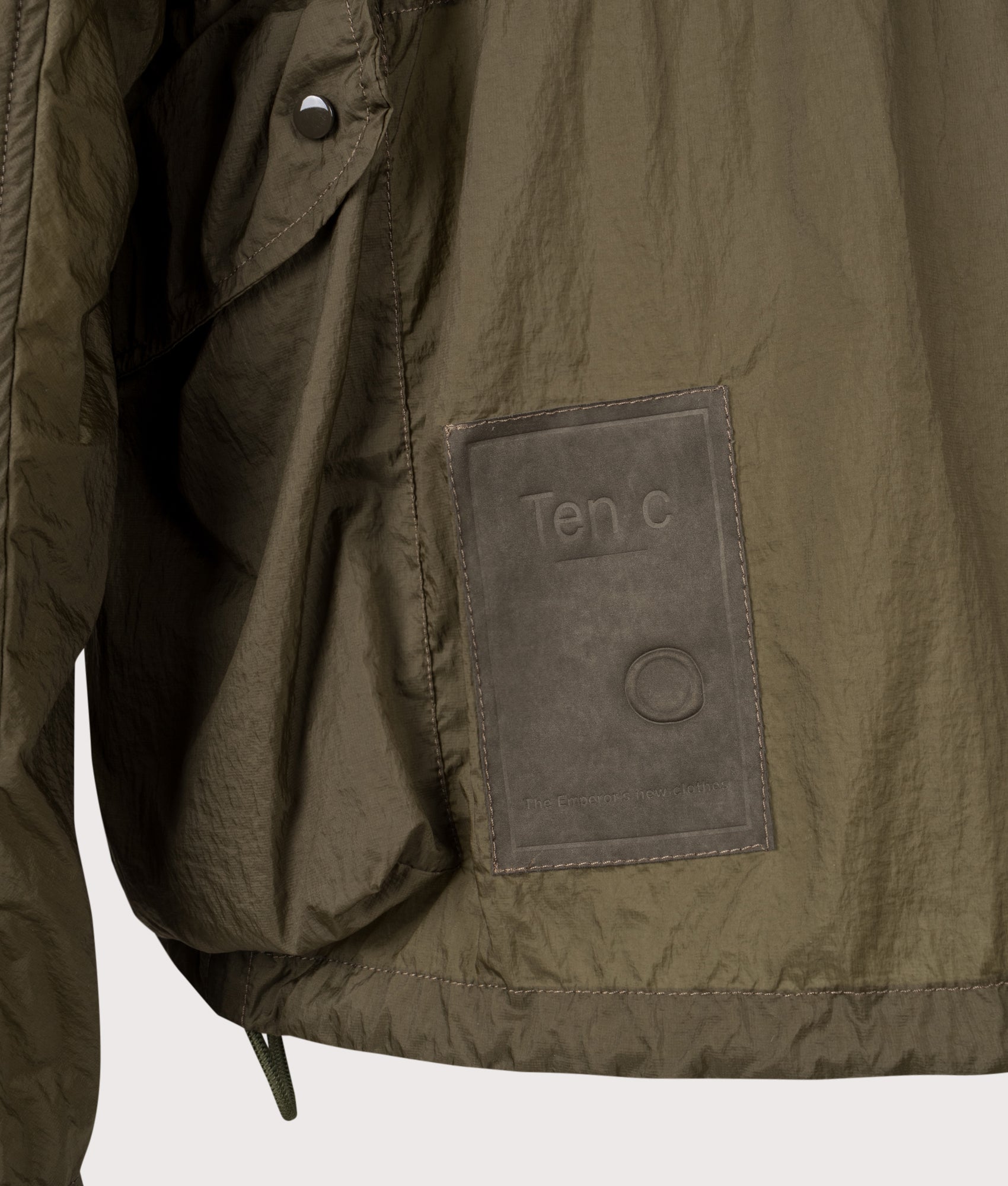 Skye Ten Anorak Jacket by Ten c in Oliva Scuro. Shot by EQVVS. Detail shot.