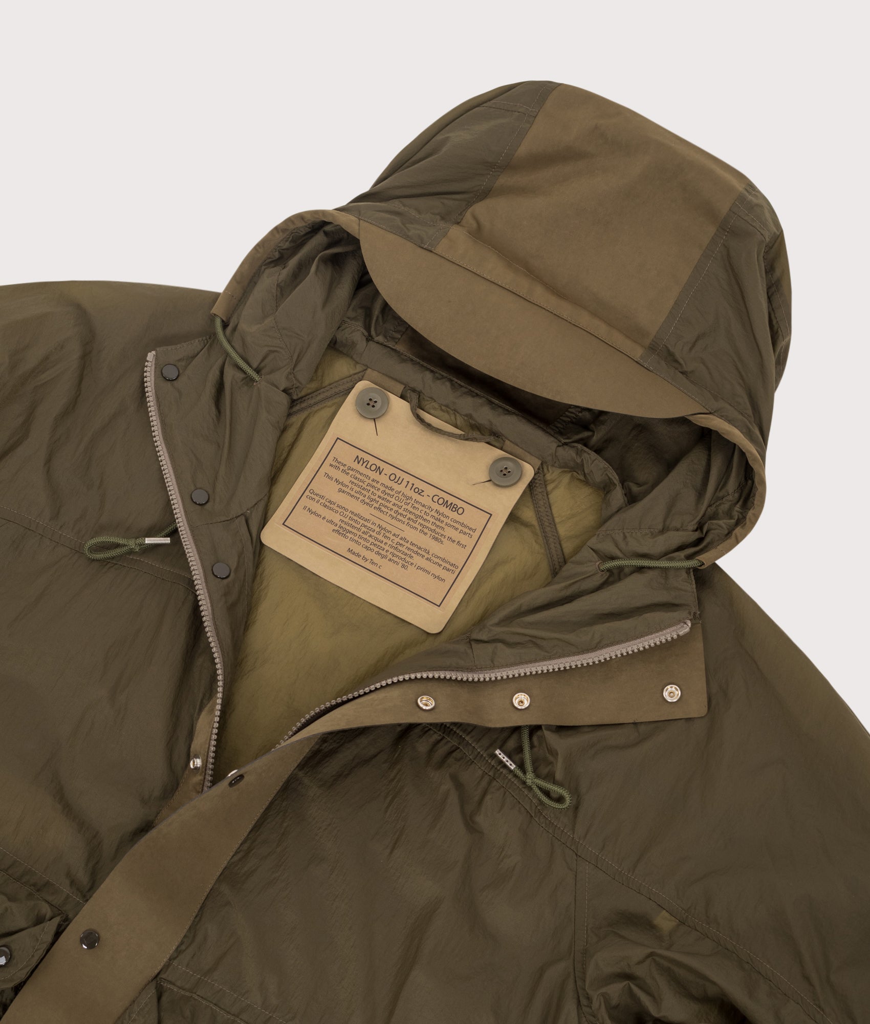 Skye Ten Anorak Jacket by Ten c in Oliva Scuro. Shot by EQVVS. Internal shot.