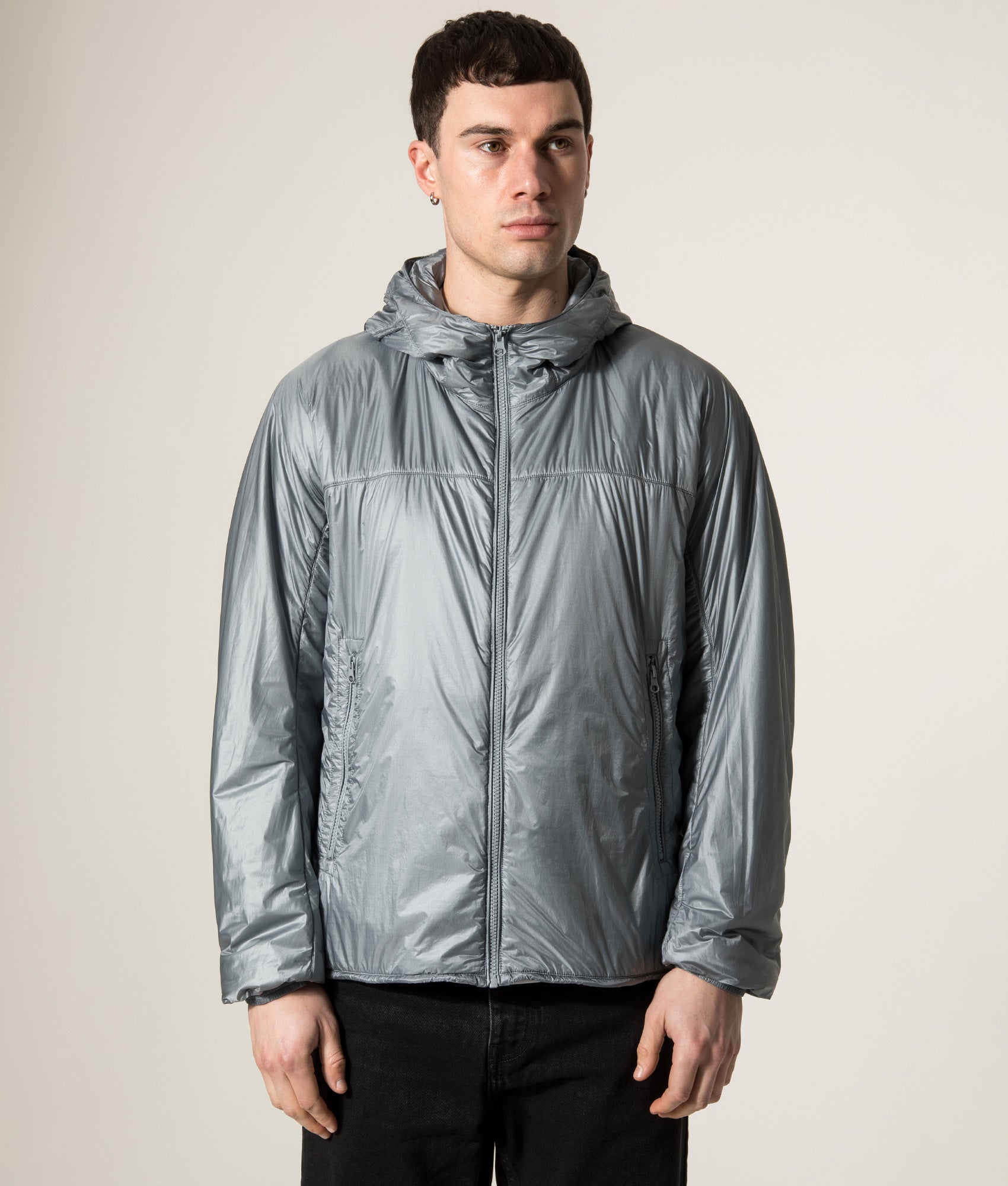 Ten c Piece Dyed Ripstop Primaloft Mid Layer Jacket in Quarry Grey at EQVVS Menswear. Model front shot.