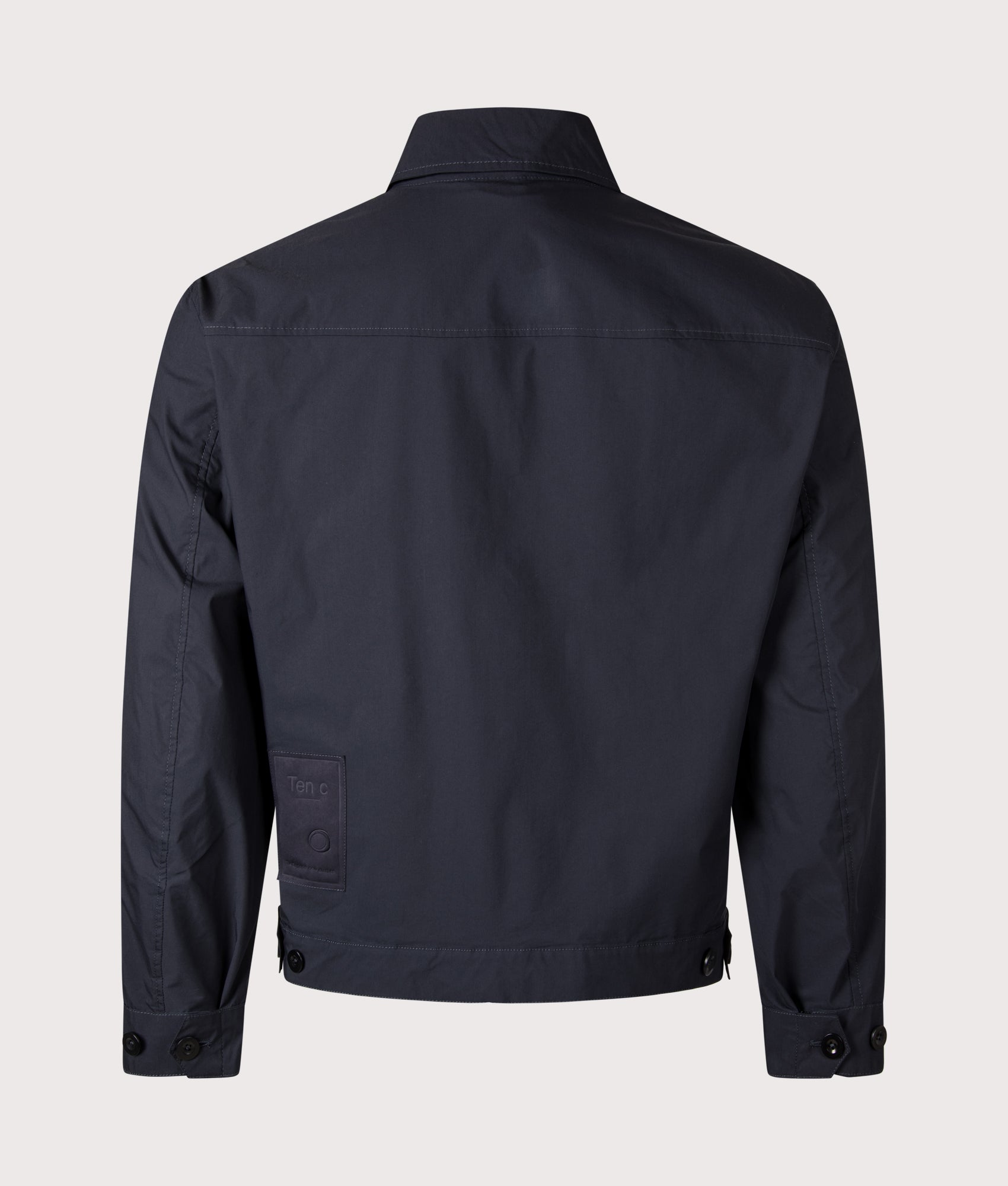 Ten c Piece Dyed Mid Layer Overshirt in Blue at EQVVS Menswear. Back shot.